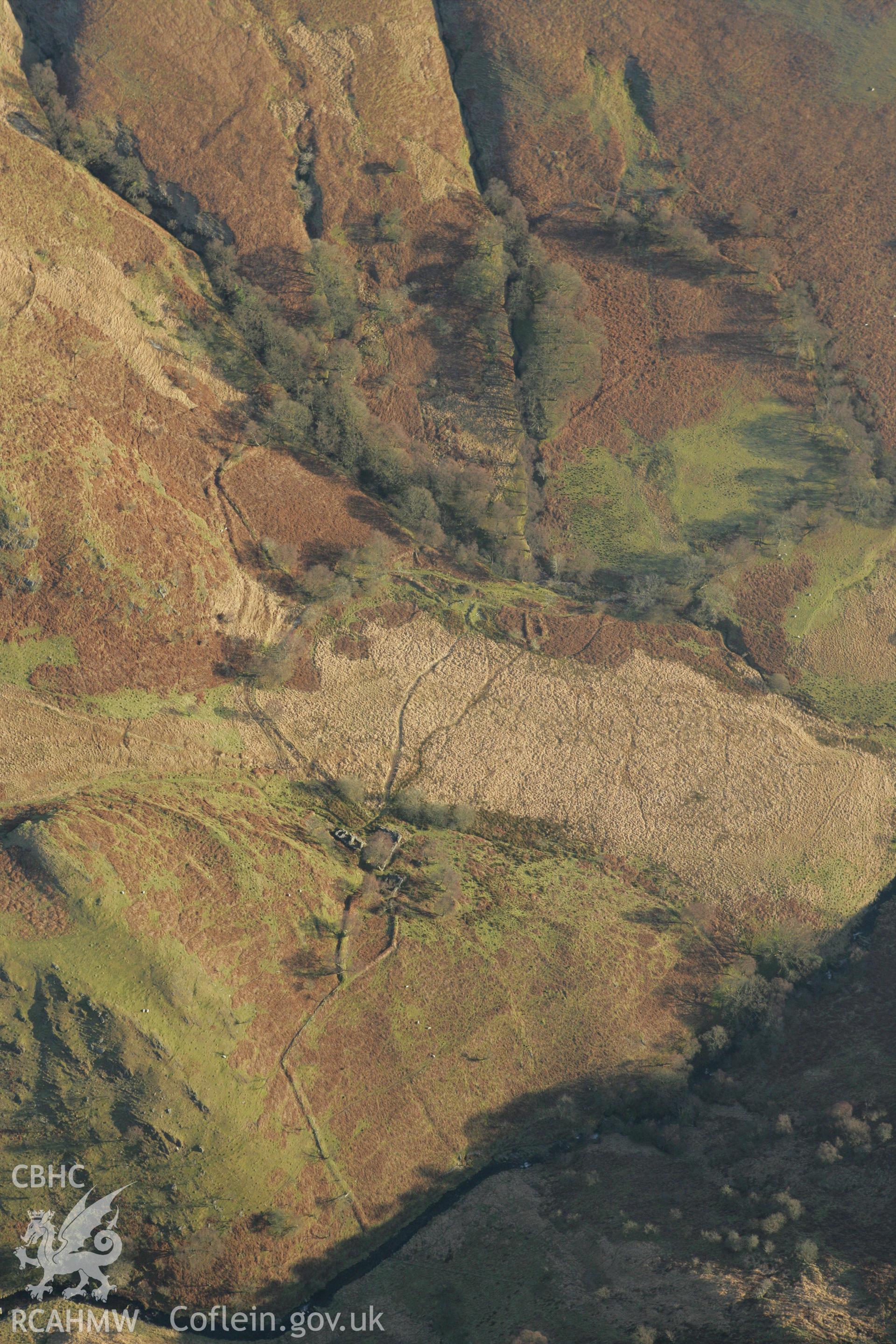 RCAHMW colour oblique photograph of Dinas Foelfraeth farmstead. Taken by Toby Driver on 20/12/2007.