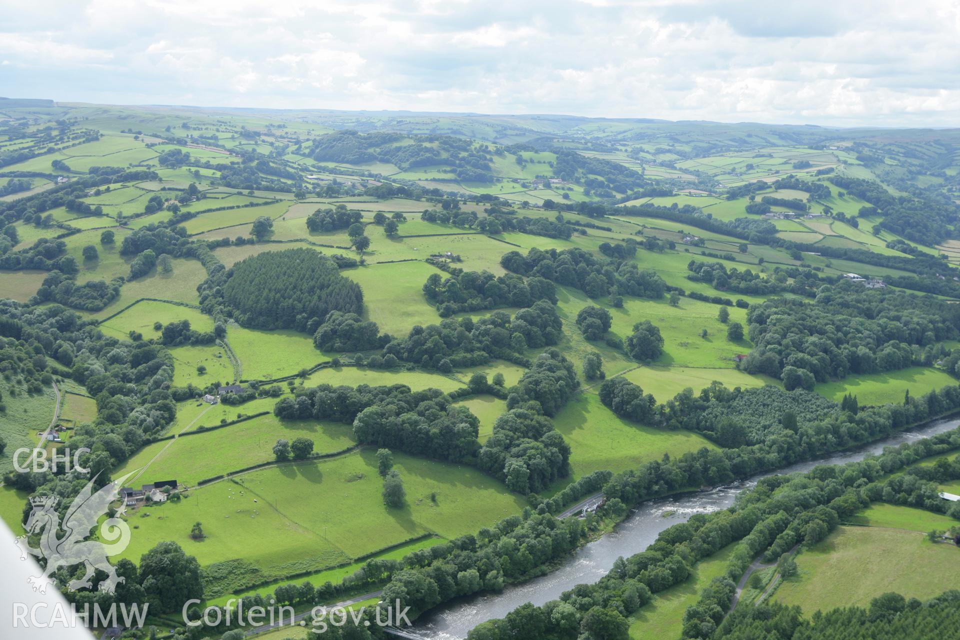 RCAHMW colour oblique aerial photograph of Hafodygarreg and surrounding landscape. Taken on 09 July 2007 by Toby Driver