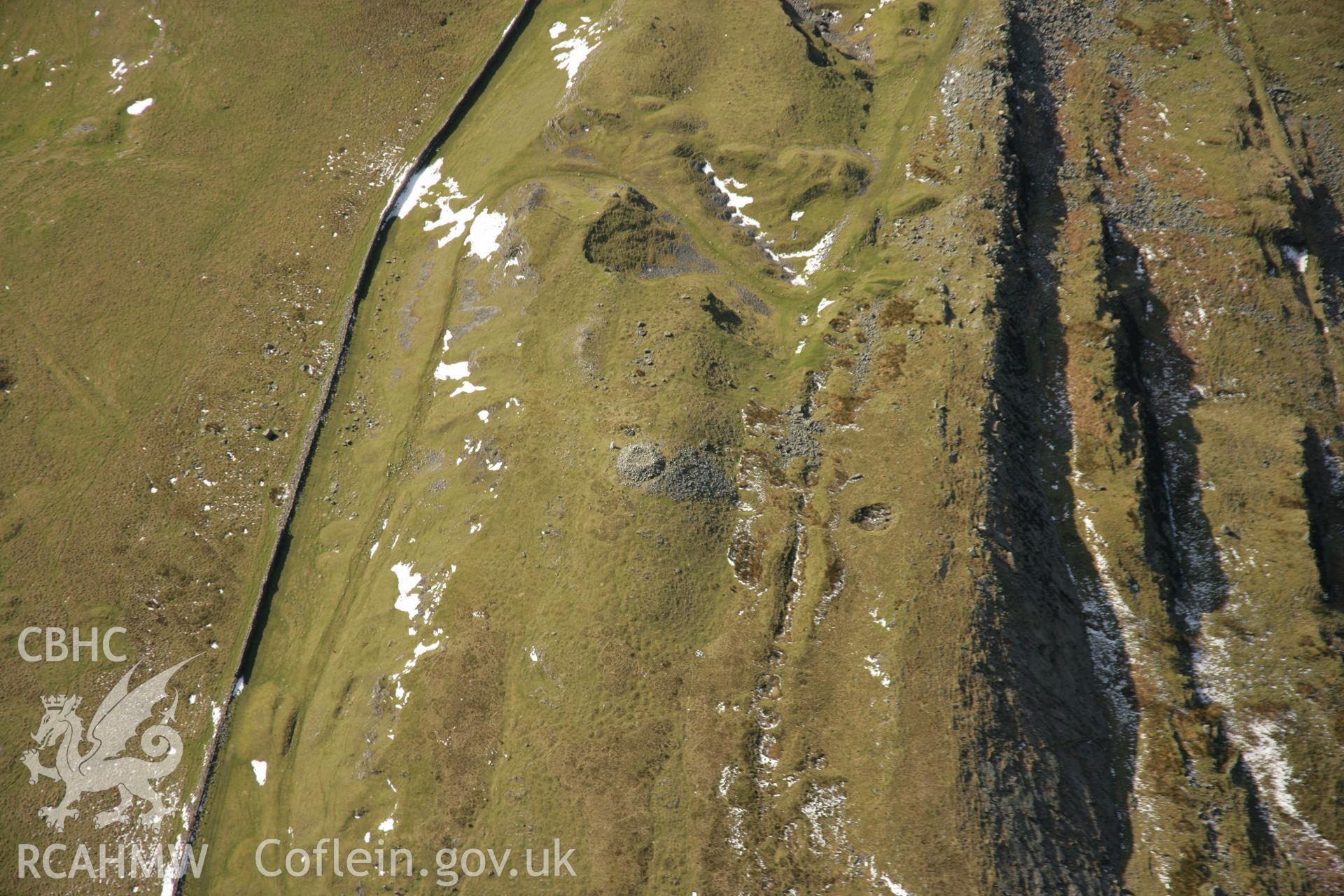 RCAHMW colour oblique aerial photograph of Cribarth Round Cairn. Taken on 21 March 2007 by Toby Driver