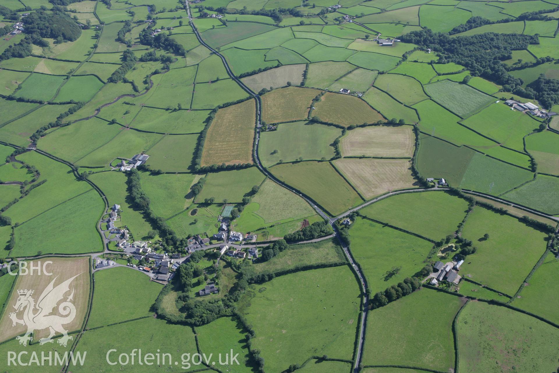 RCAHMW colour oblique aerial photograph of St Maelog's Church, Llandyfaelog, showing the circular churchyard. Taken on 30 July 2007 by Toby Driver