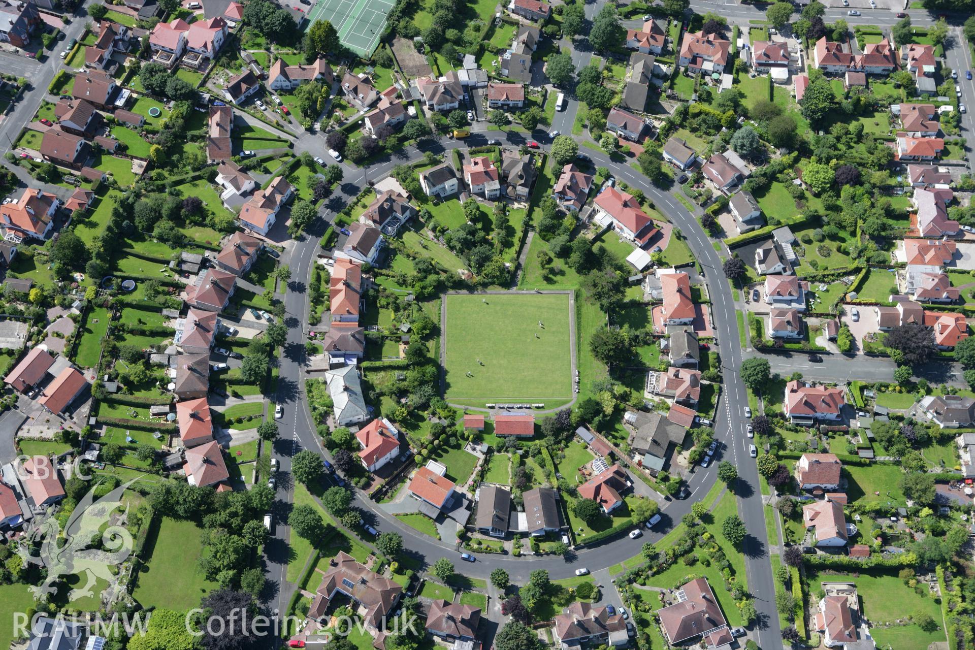 RCAHMW colour oblique aerial photograph of Prestatyn showing a housing estate and bowling green. Taken on 31 July 2007 by Toby Driver