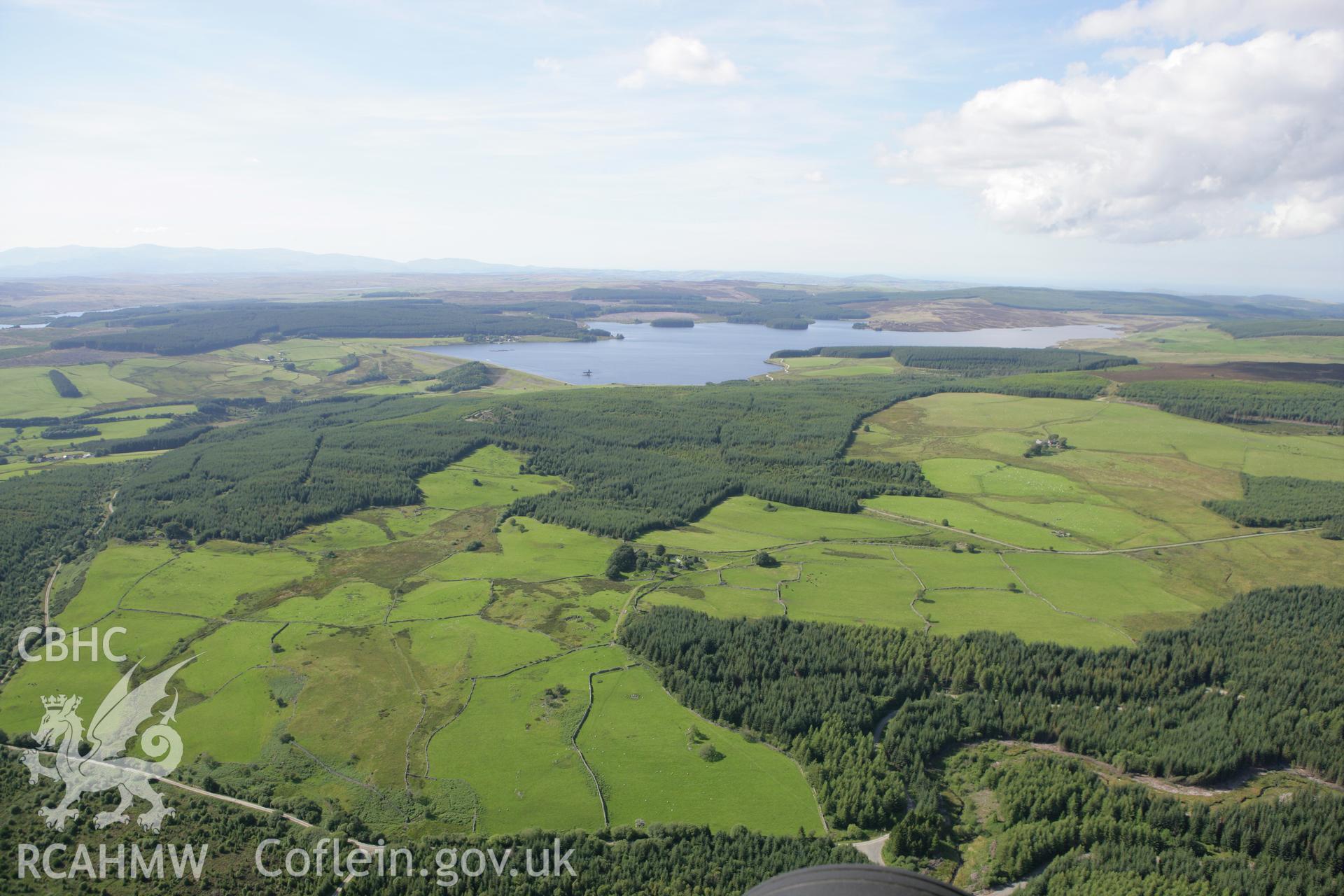 RCAHMW colour oblique aerial photograph showing distant landscape of Llyn Brenig from the south-east. Taken on 31 July 2007 by Toby Driver