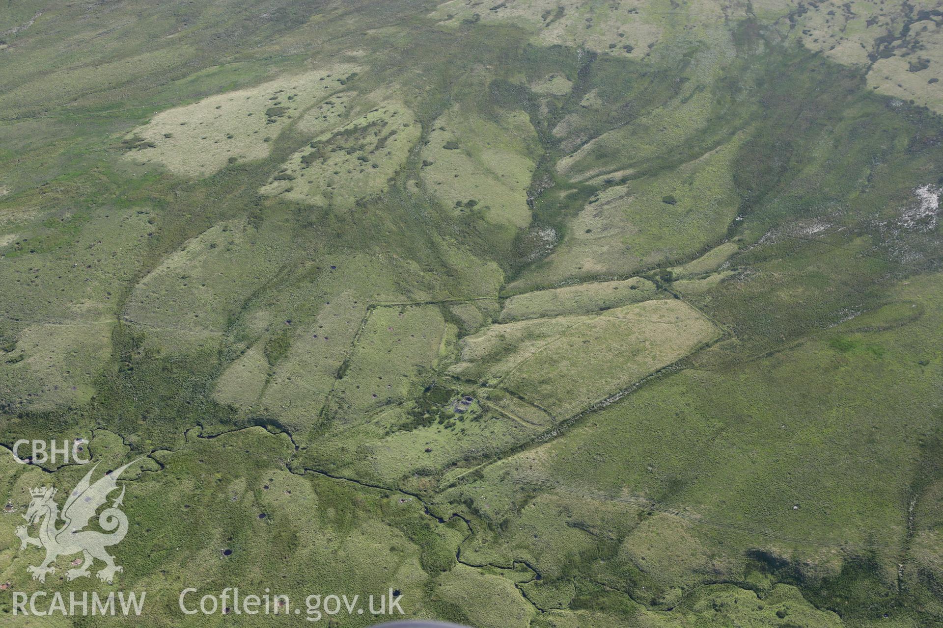 RCAHMW colour oblique aerial photograph of the farmstead at Ysgir Fechan. Taken on 08 August 2007 by Toby Driver