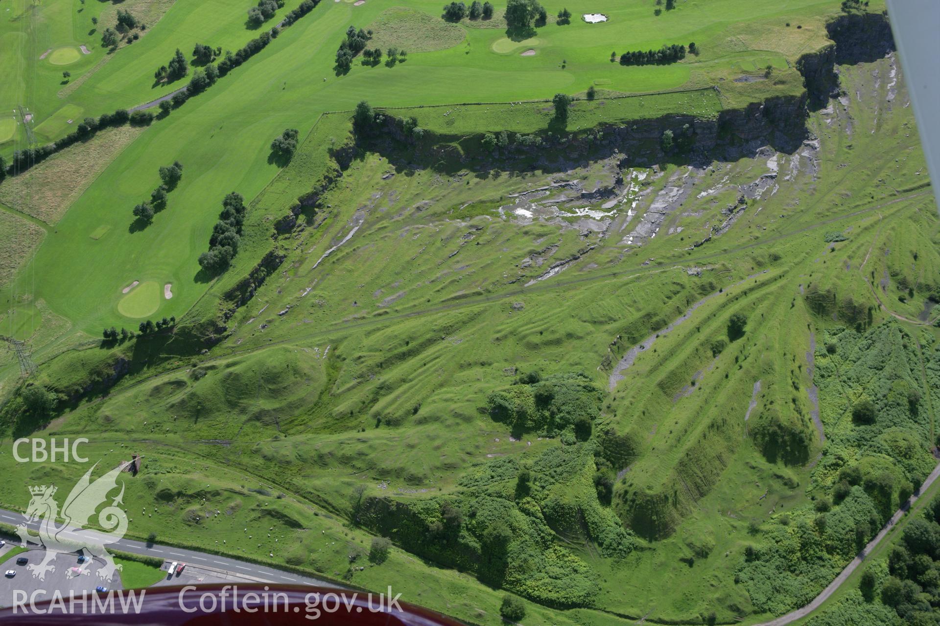 RCAHMW colour oblique aerial photograph of Morlais Castle Quarries (East). Taken on 30 July 2007 by Toby Driver
