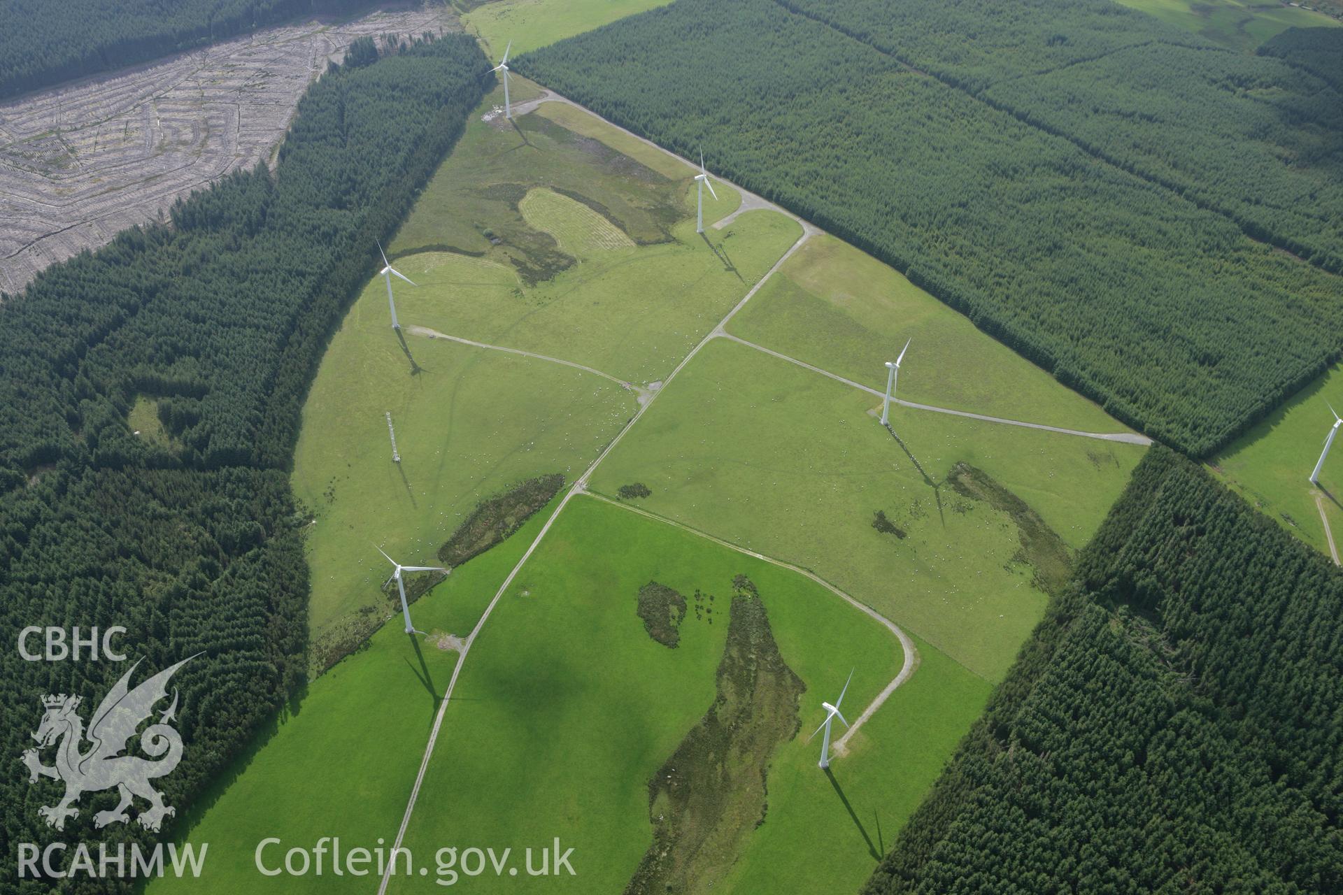 RCAHMW colour oblique aerial photograph of Tir Mostyn Windfarm. Taken on 31 July 2007 by Toby Driver