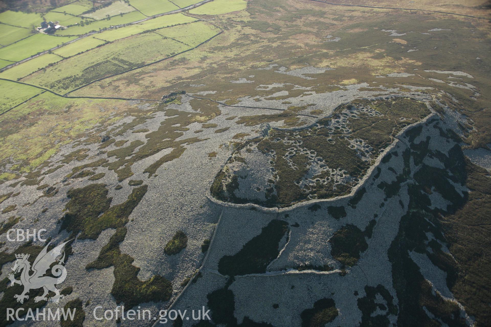 RCAHMW colour oblique aerial photograph of Tre'r Ceiri Fort, Llanaelhaearn. Taken on 25 January 2007 by Toby Driver