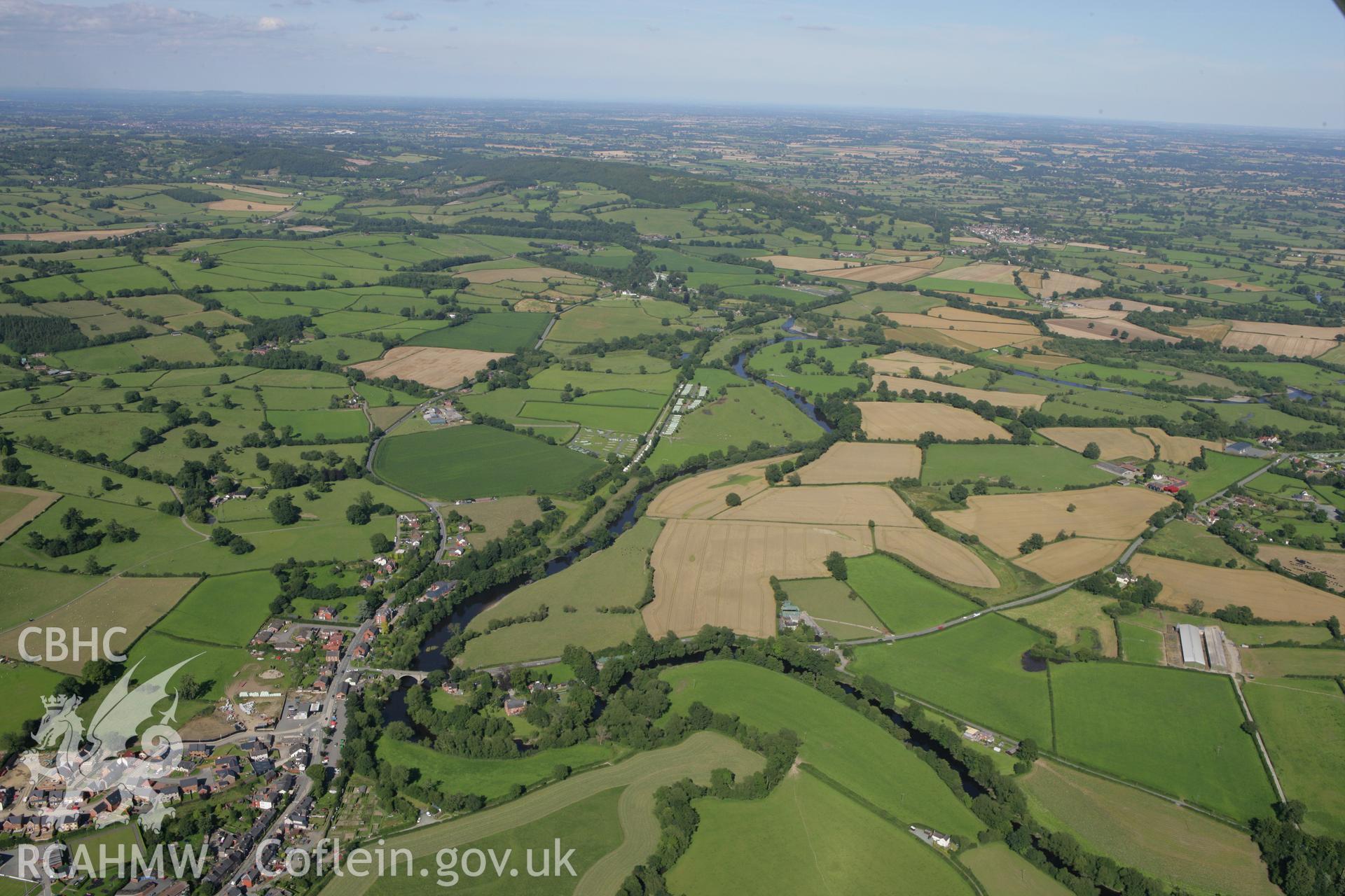 RCAHMW colour oblique aerial photograph of Glandwr No 1 and other buildings in Llansantffraid ym Mechain, in landscape view towards the east. Taken on 31 July 2007 by Toby Driver