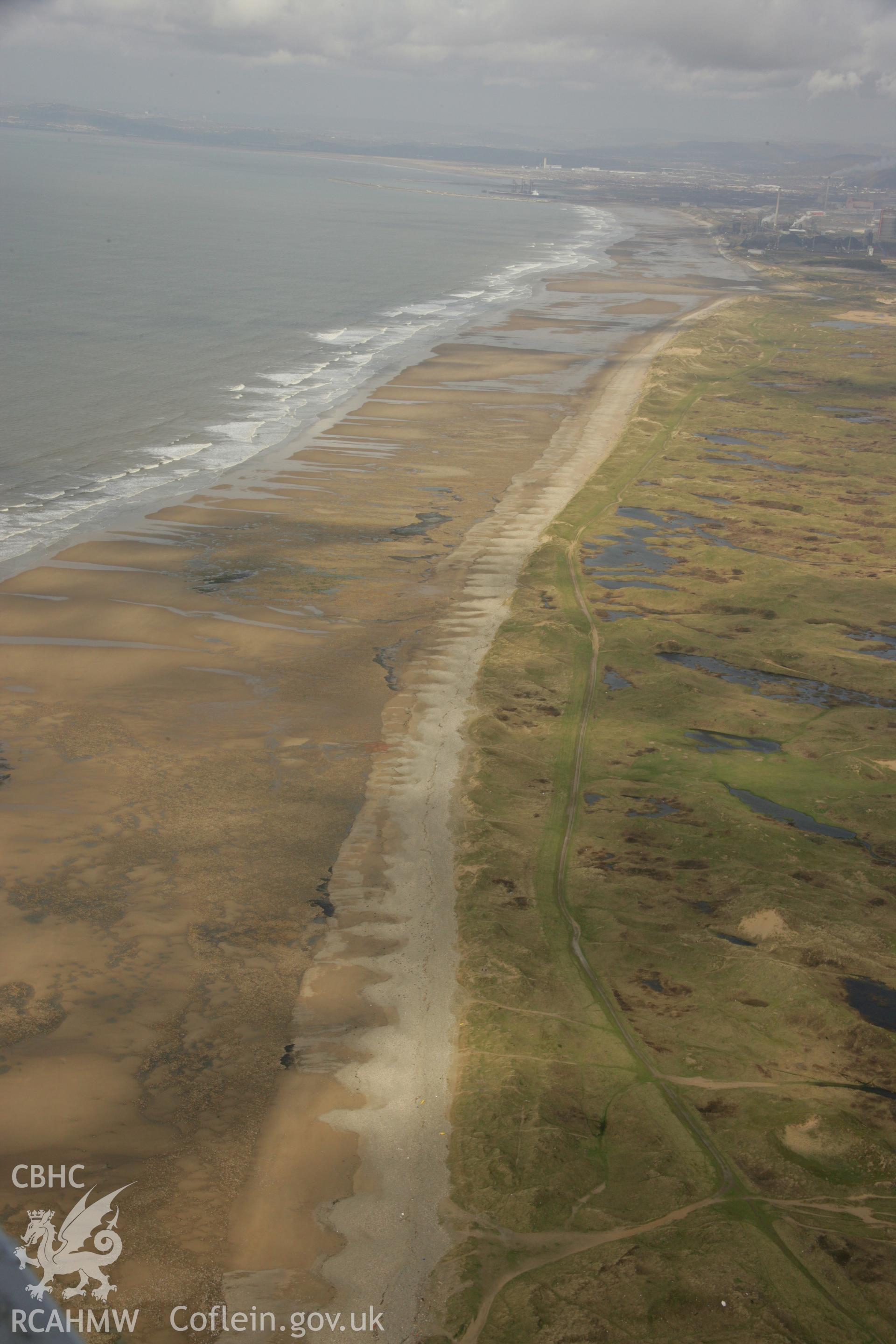 RCAHMW colour oblique aerial photograph of Gwely'r Misgl Wreck on Kenfig Sands. Taken on 16 March 2007 by Toby Driver