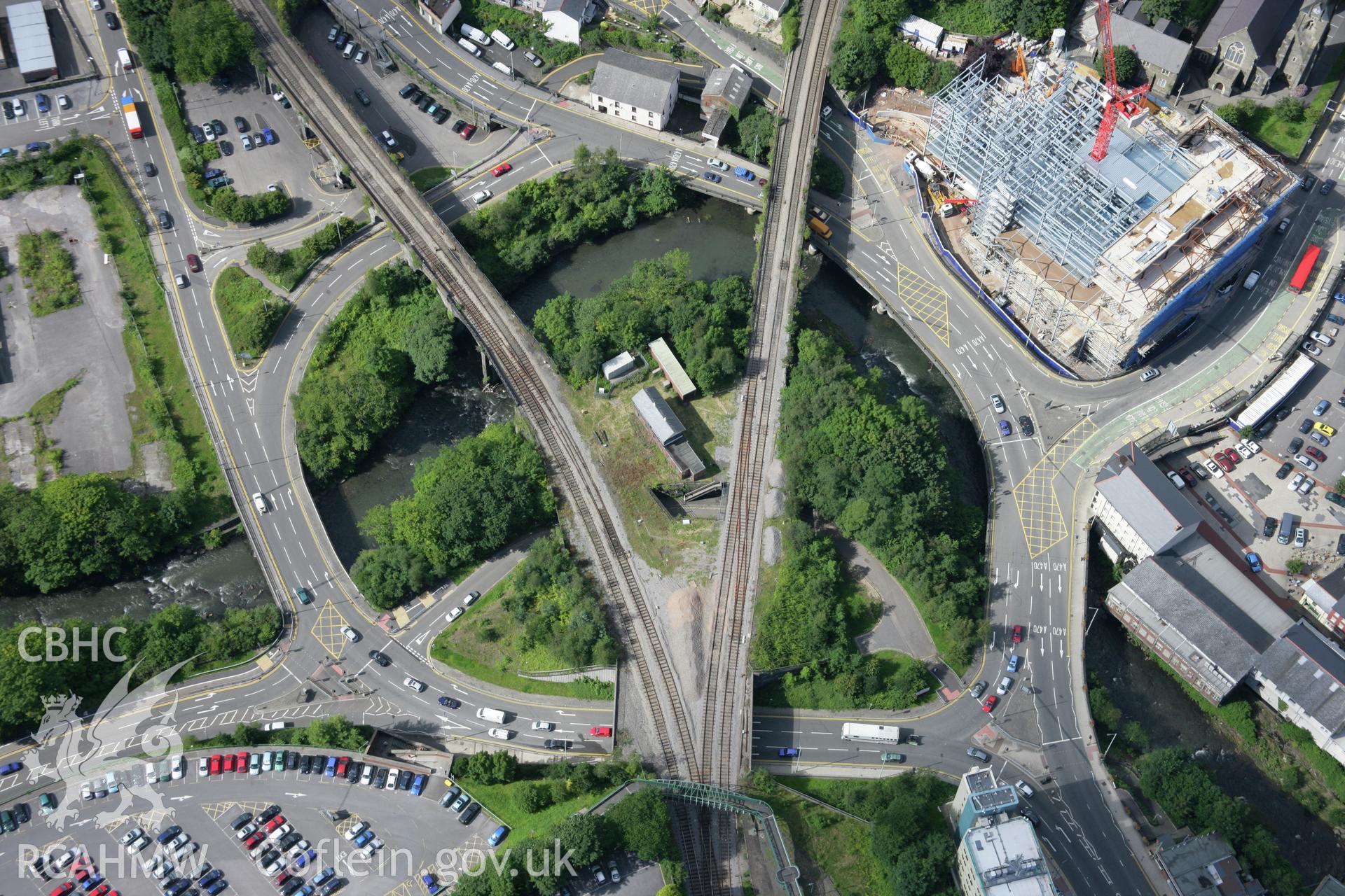 RCAHMW colour oblique aerial photograph of Pontypridd showing the railway junction and nearby roads. Taken on 30 July 2007 by Toby Driver