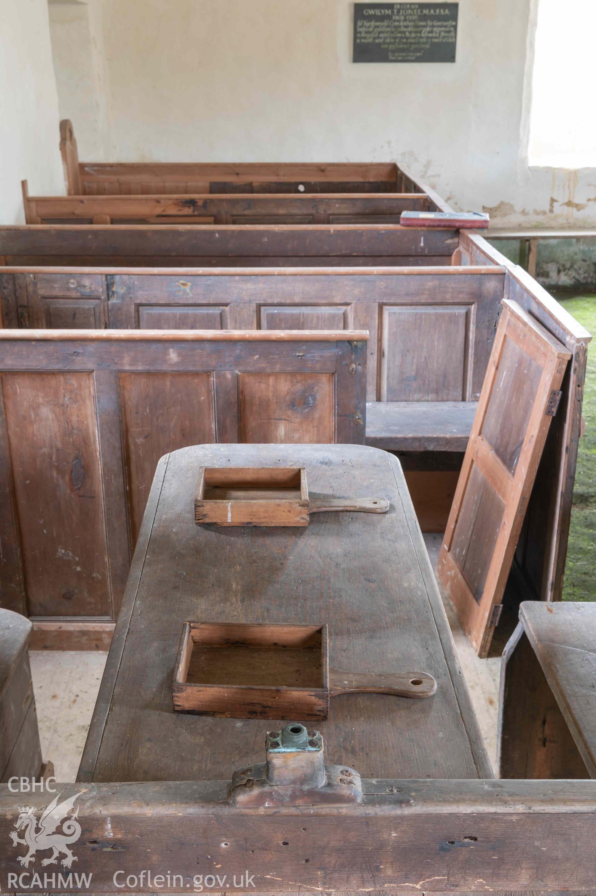 Capel Newydd - View of the Sedd Fawr with collection boxes on the table, taken from West