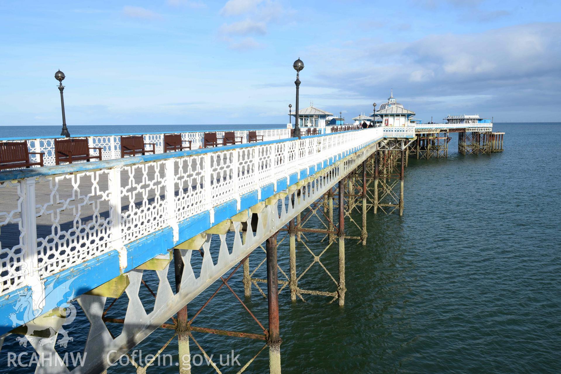 Llandudno Pier: view north-east along length of pier towards pavilion. Left hand (west) kiosk lost in 2024 Storm Derragh