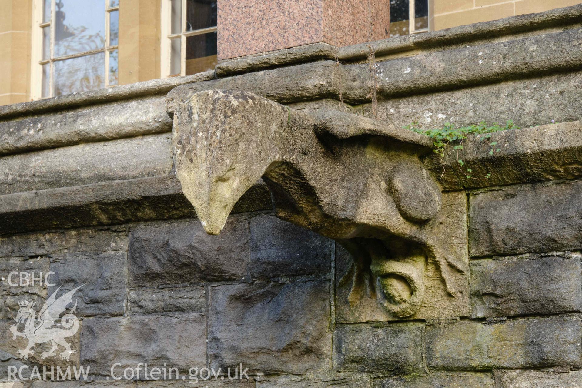 Bird carving on sill of loggia, W front