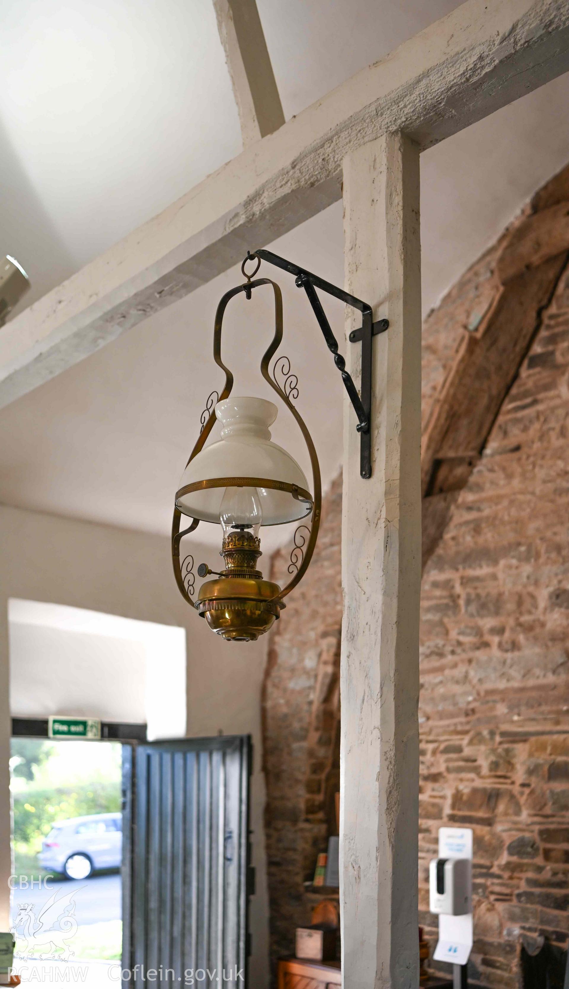 Maesyronen Chapel - Detailed view of a second lamp on a wall-mounted bracket, taken from North