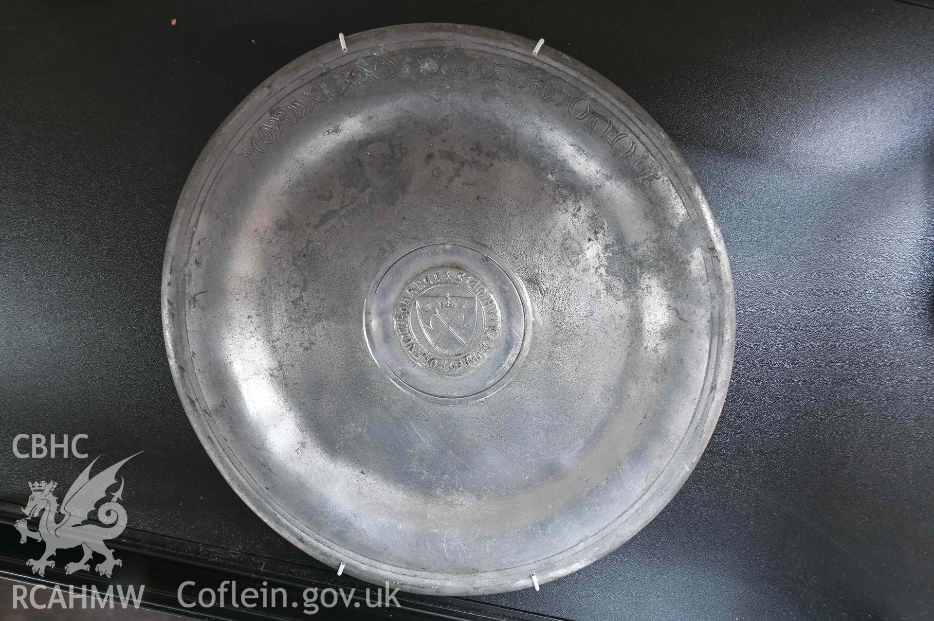 Norwegian Church - Detailed view of a metal plate on display, taken from East