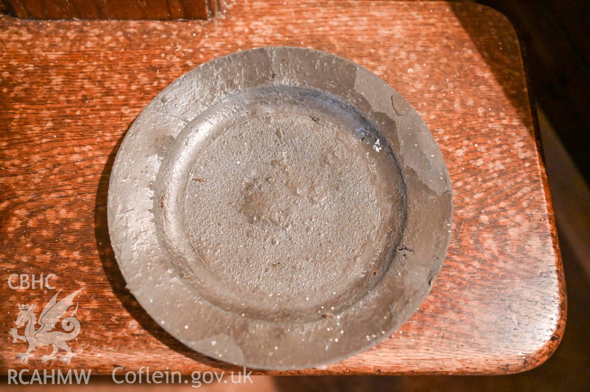 Tre-Wen Welsh Independent Chapel - Interior: Chapel, detailed view of a metal plate on a small table, taken from West