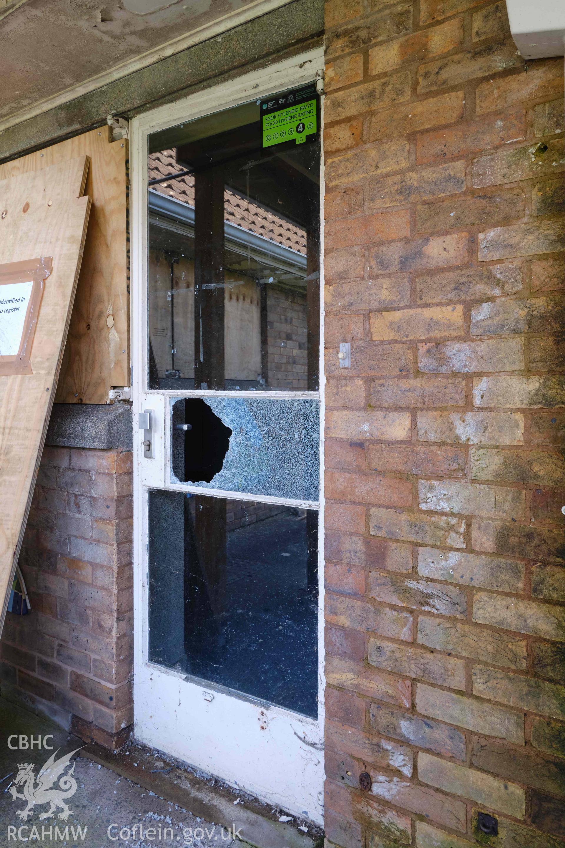 steel and glass door, NW front
