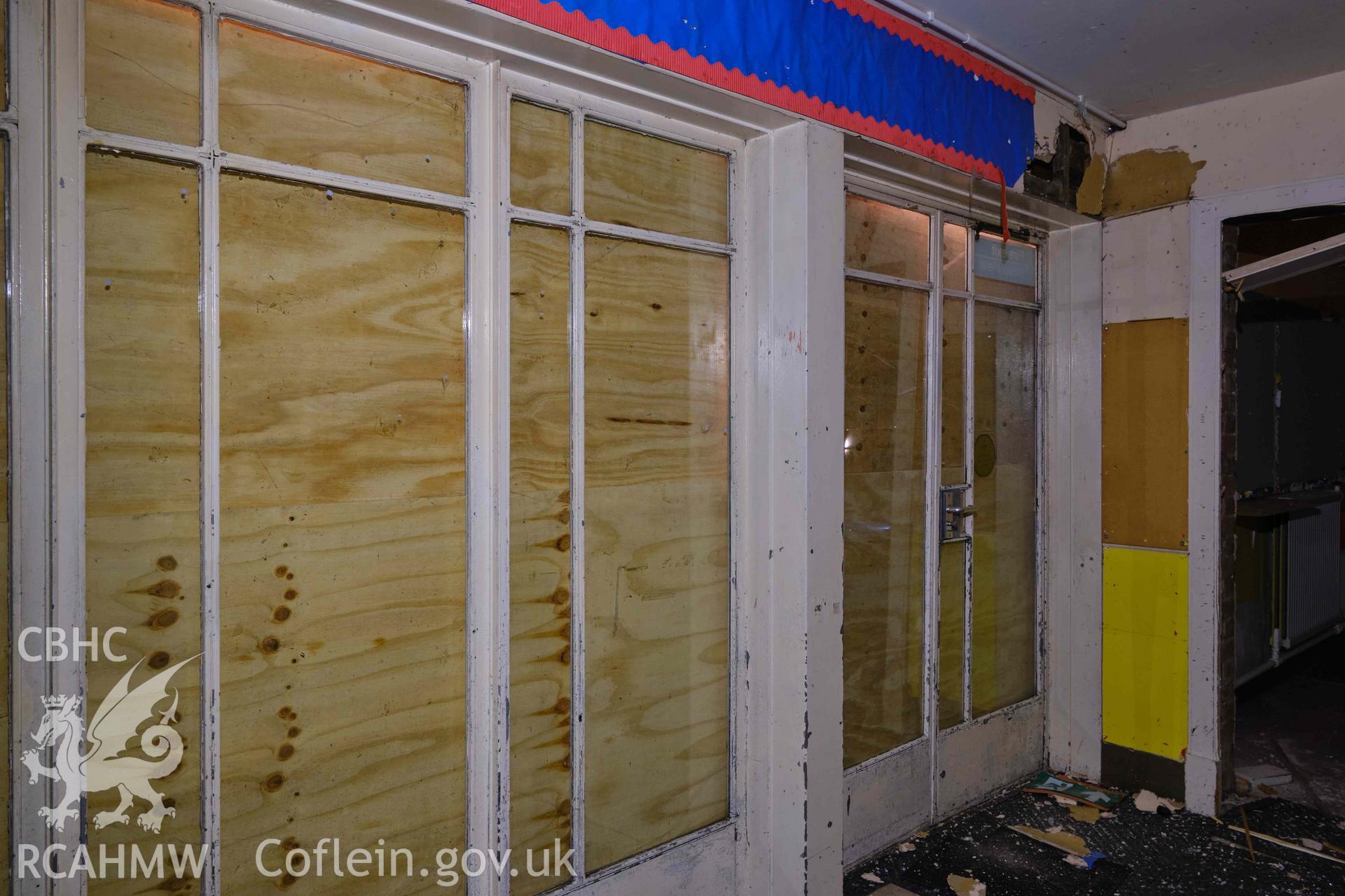 window and doors in lobby outside classroom 3, looking SE