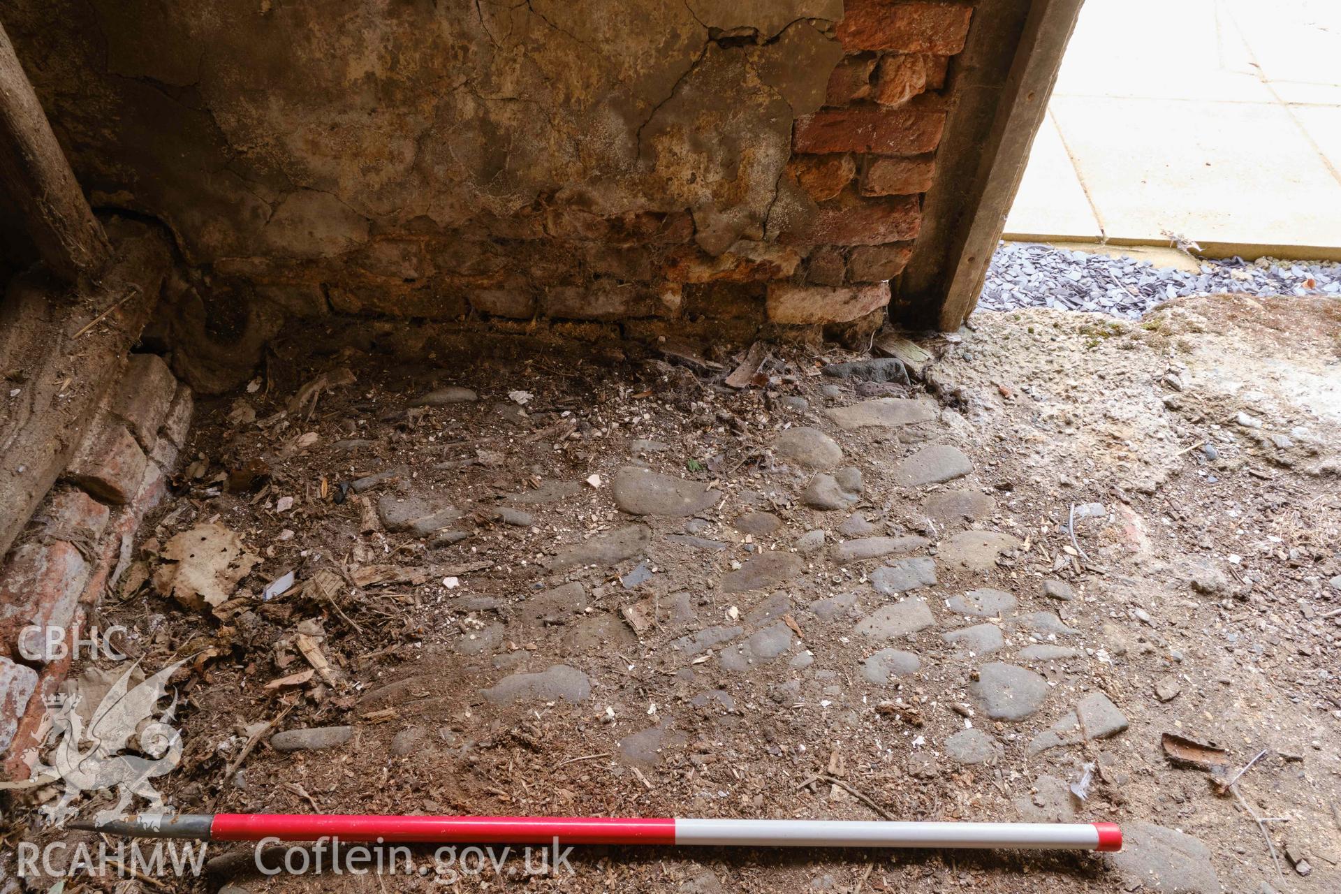 partial remains of cobbled floor in loose box (unit 2), looking S