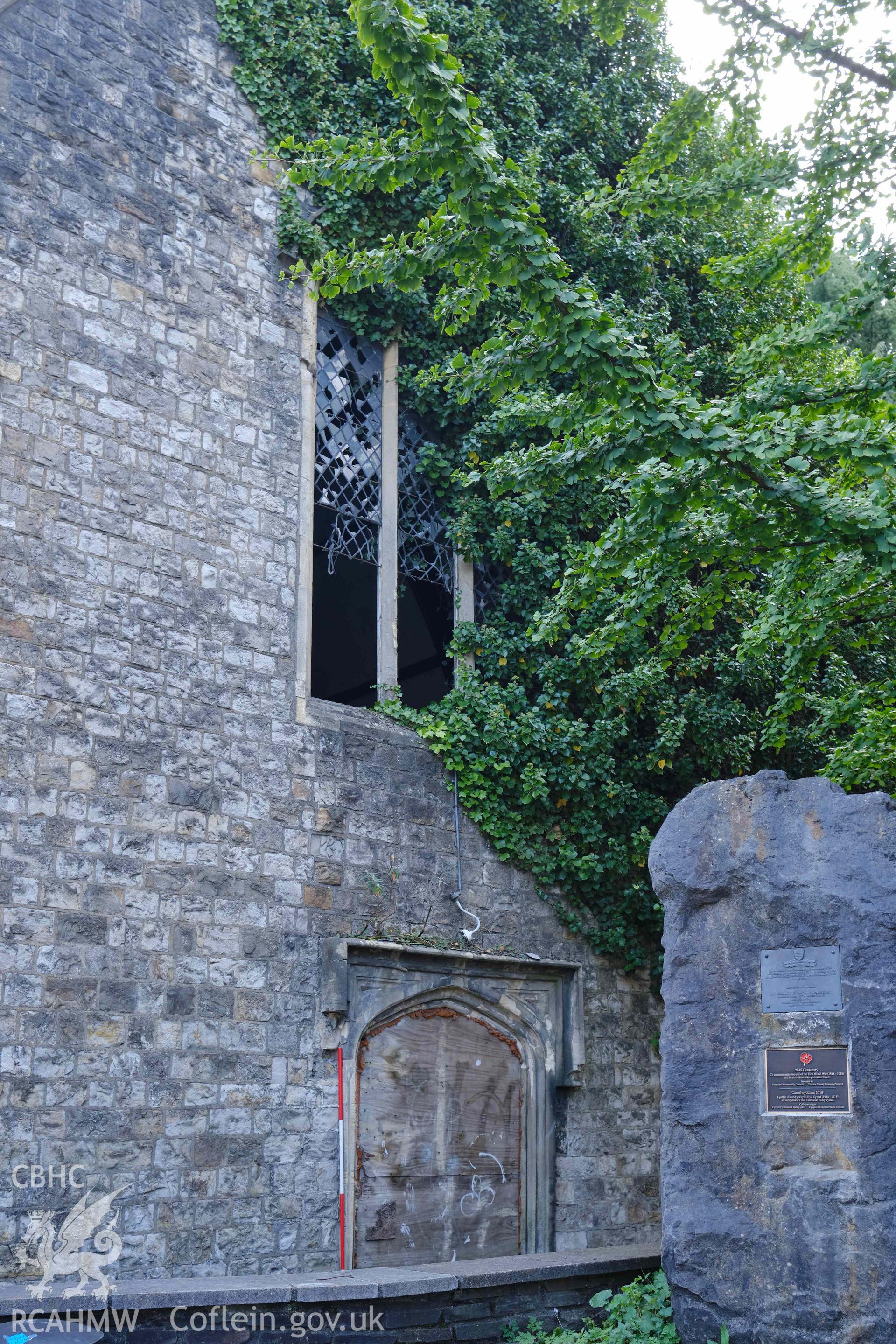 detail of nave 'West' wall, showing doorway and window, looking S