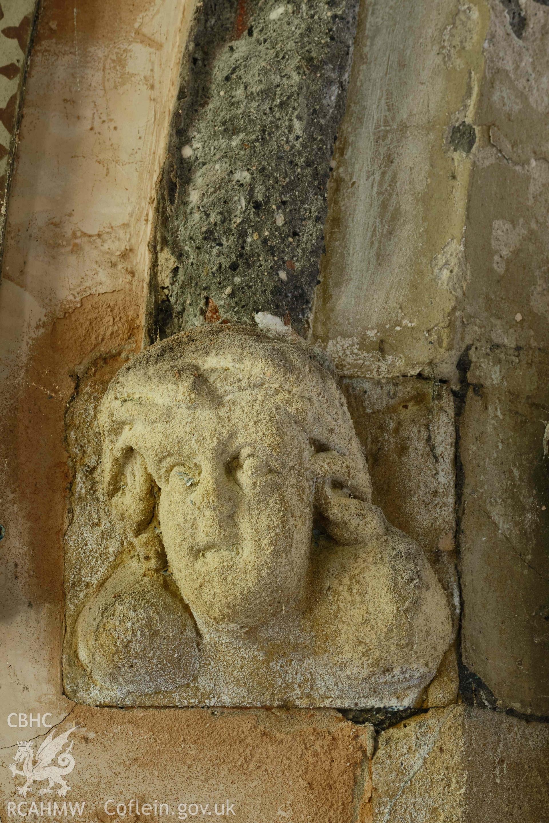 head stop, chancel arch N side