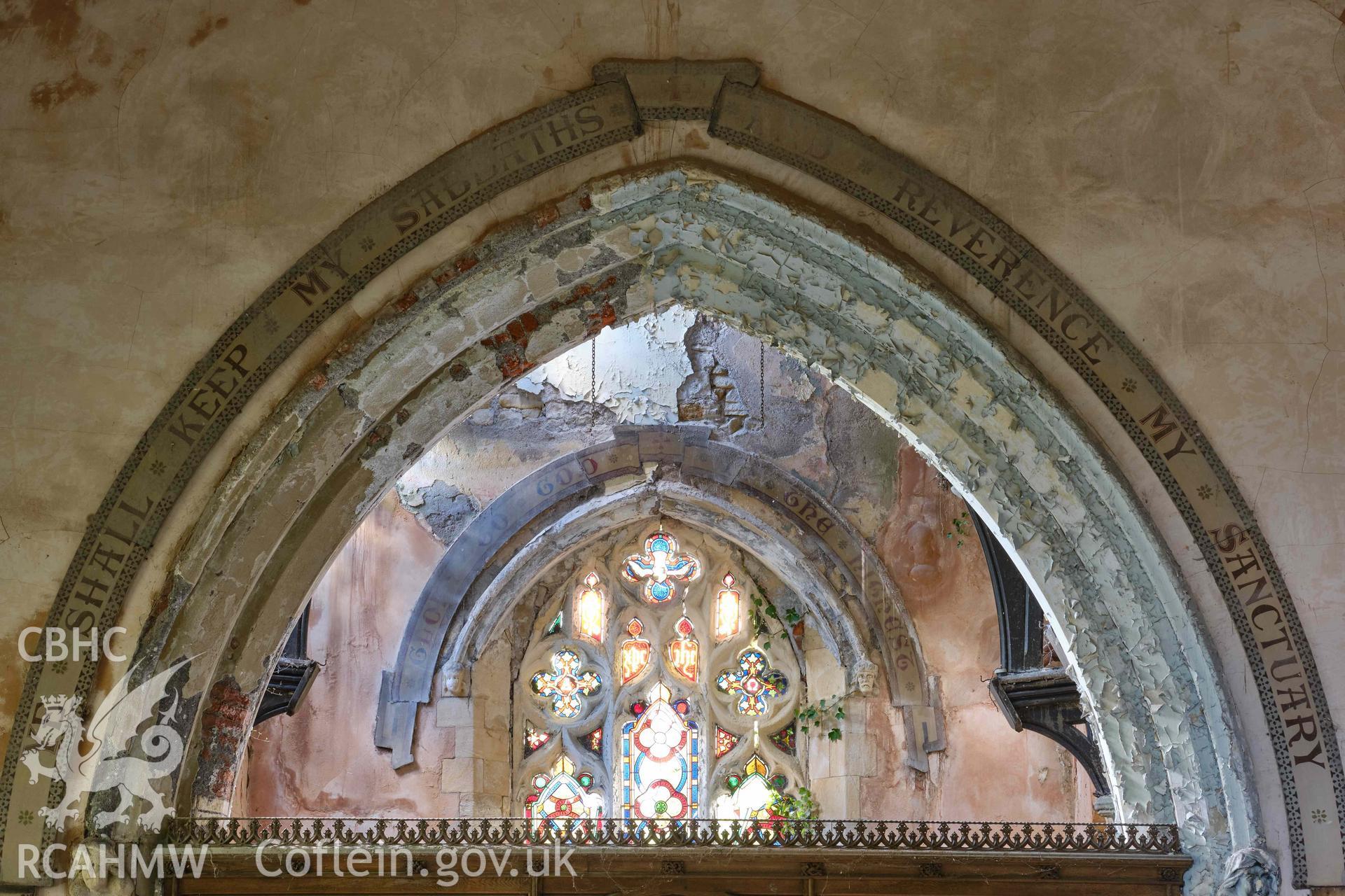 painted decoration above chancel arch and E window