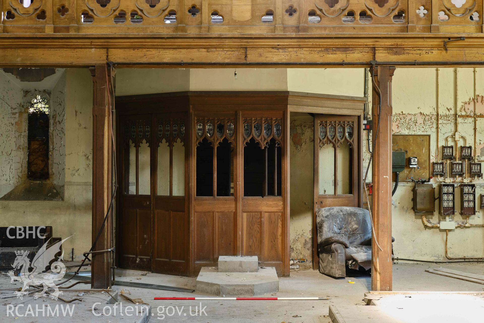 Screen to nave W entrance lobby, and font base, looking W