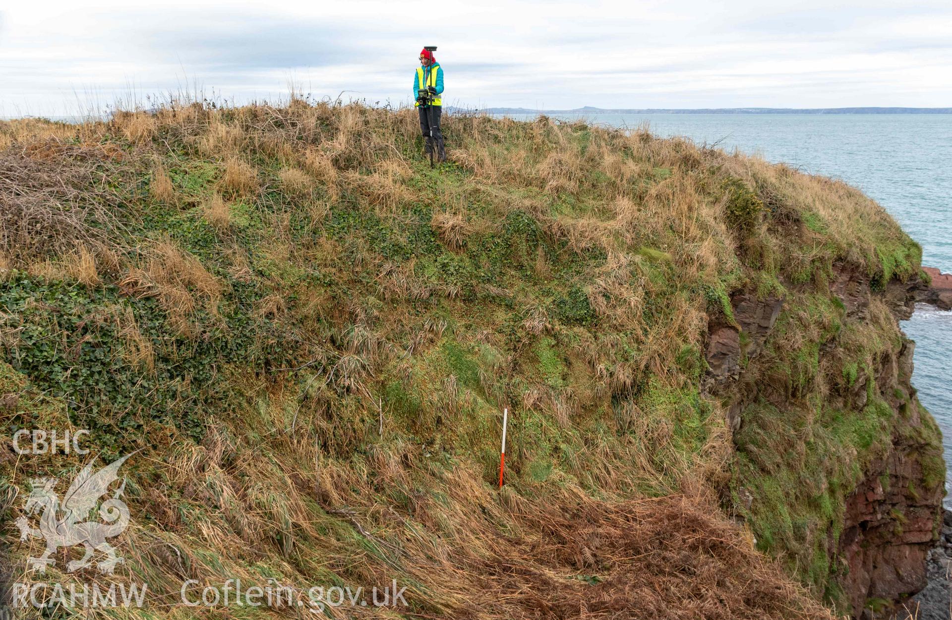 Castle Head Coastal Promontory Fort. Inner bank and rock cut ditch to east of entrance (with scale).