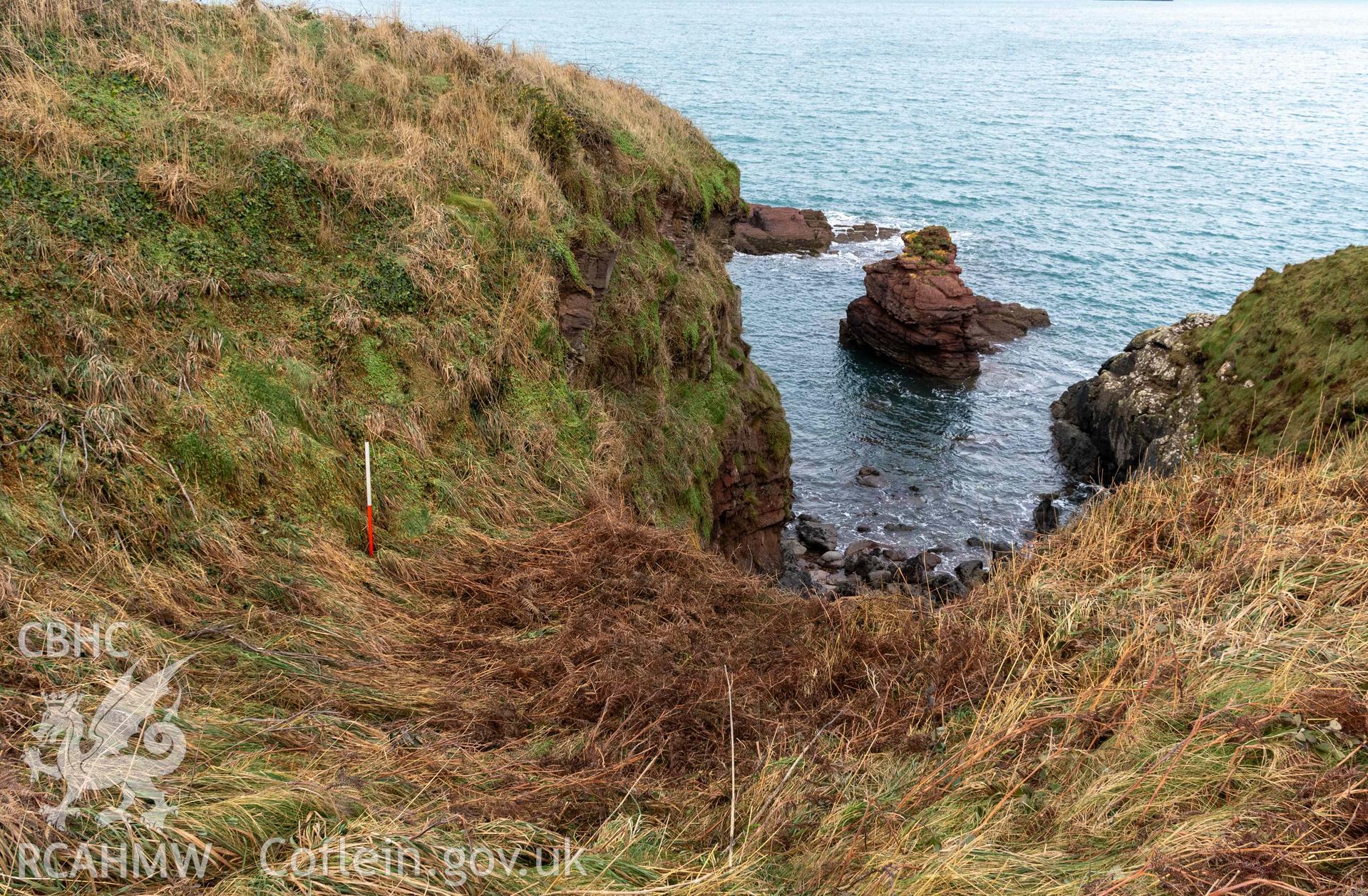 Castle Head Coastal Promontory Fort. Rock cut ditch to east of entrance (with scale).