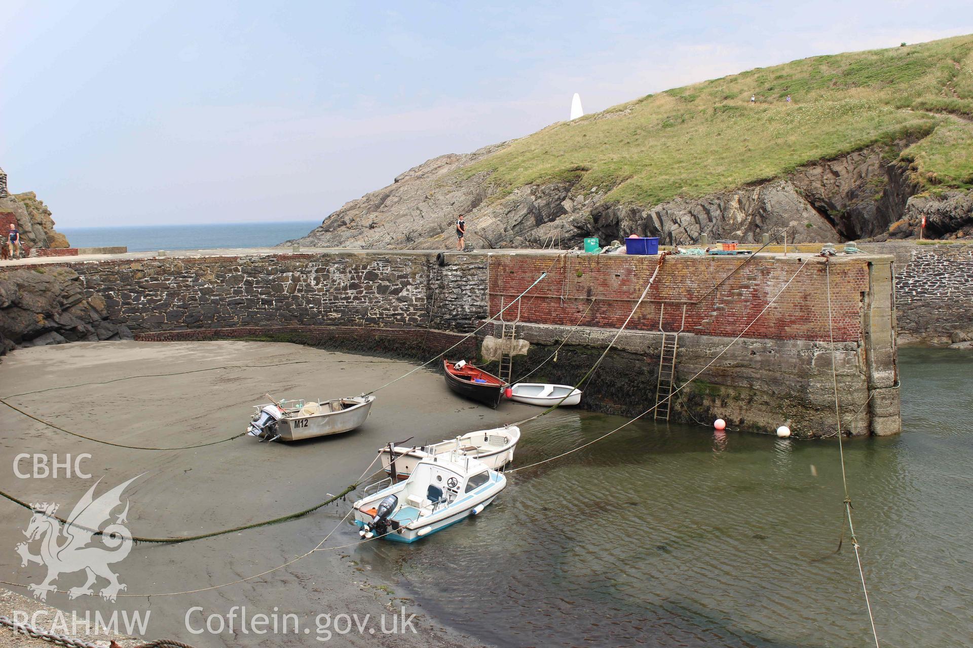 Porthgain Harbour: view of harbour from western side towards white stone marker