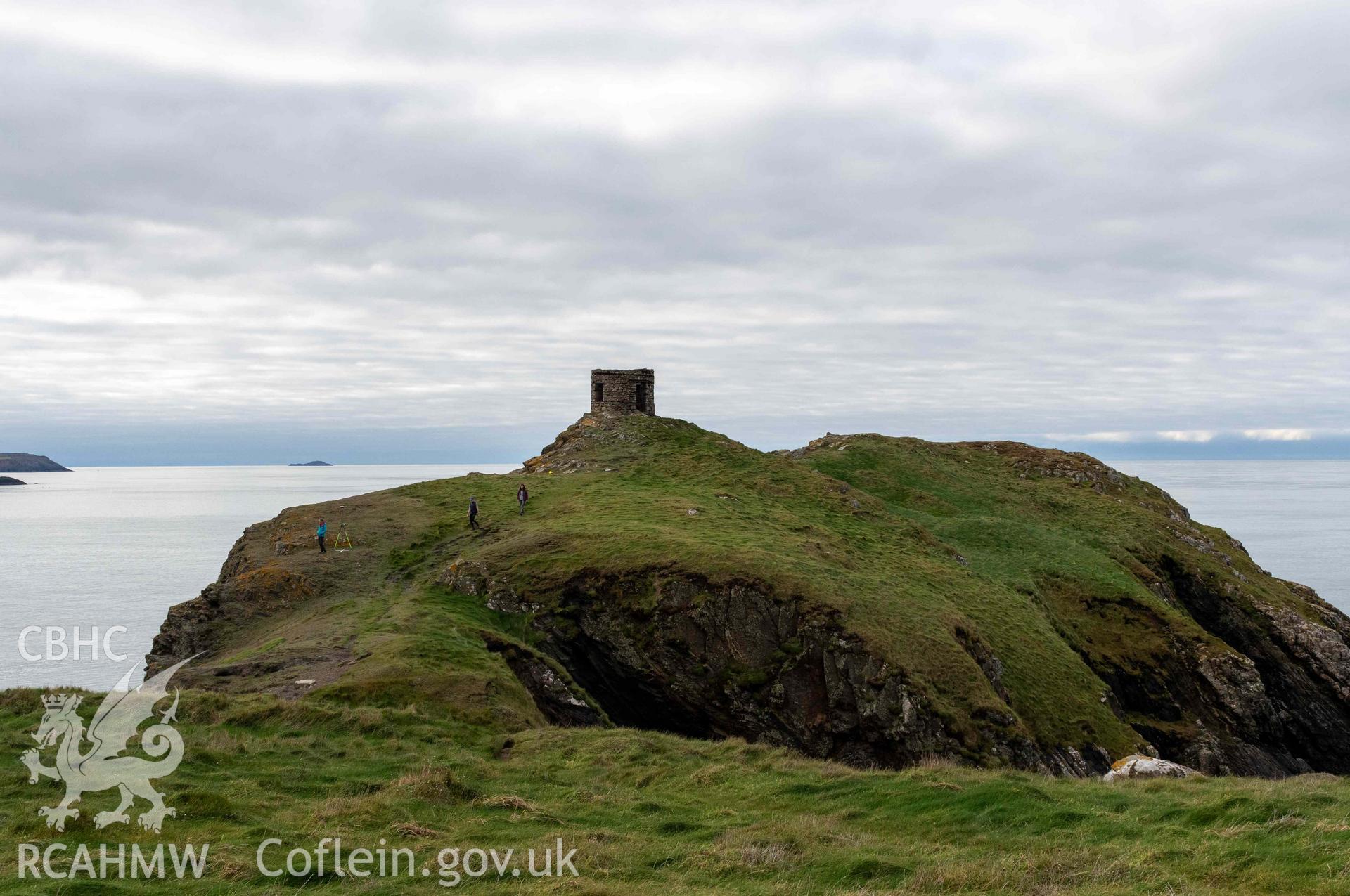 Trwyn Castell coastal promontory fort. View looking west over defences situated across the narrowest point of the promontory into the fort interior.