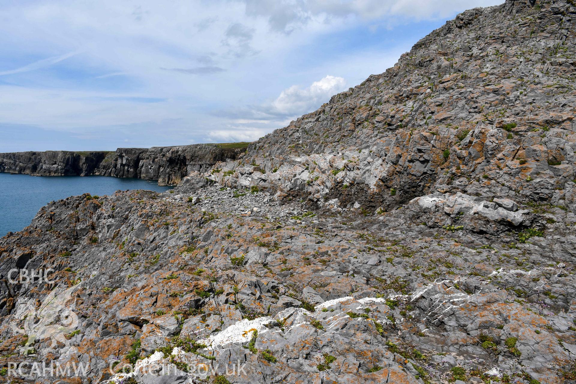 Exposed rockface and terrace/ledge at the southern tip of the promontory fort, looking northeast.