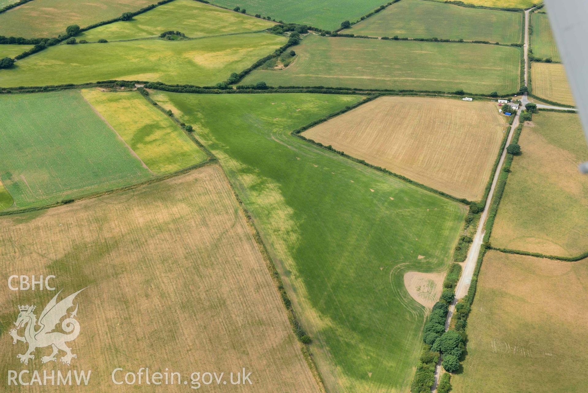 RCAHMW colour oblique aerial photograph of Post coch barrow pair taken on 11 July 2018 by Toby Driver