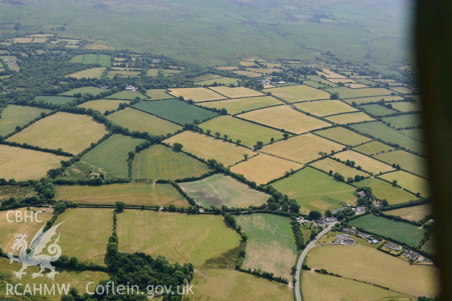 RCAHMW colour oblique aerial photograph of Caerau Crosswell villa and soil mark near Nolton Haven taken on 11 July 2018 by Toby Driver