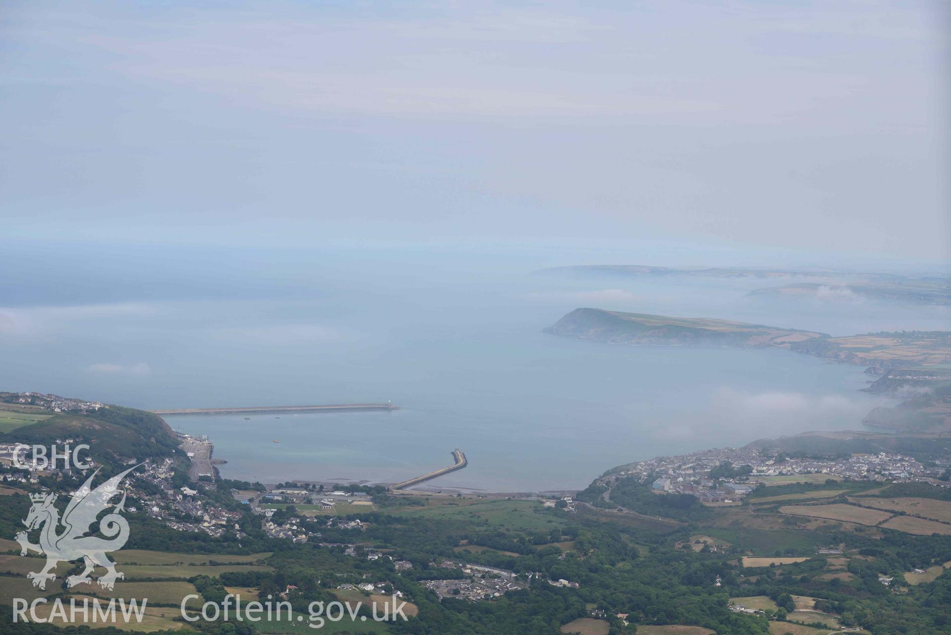 RCAHMW colour oblique aerial photograph of Fishguard harbour and Goodwick taken on 11 July 2018 by Toby Driver