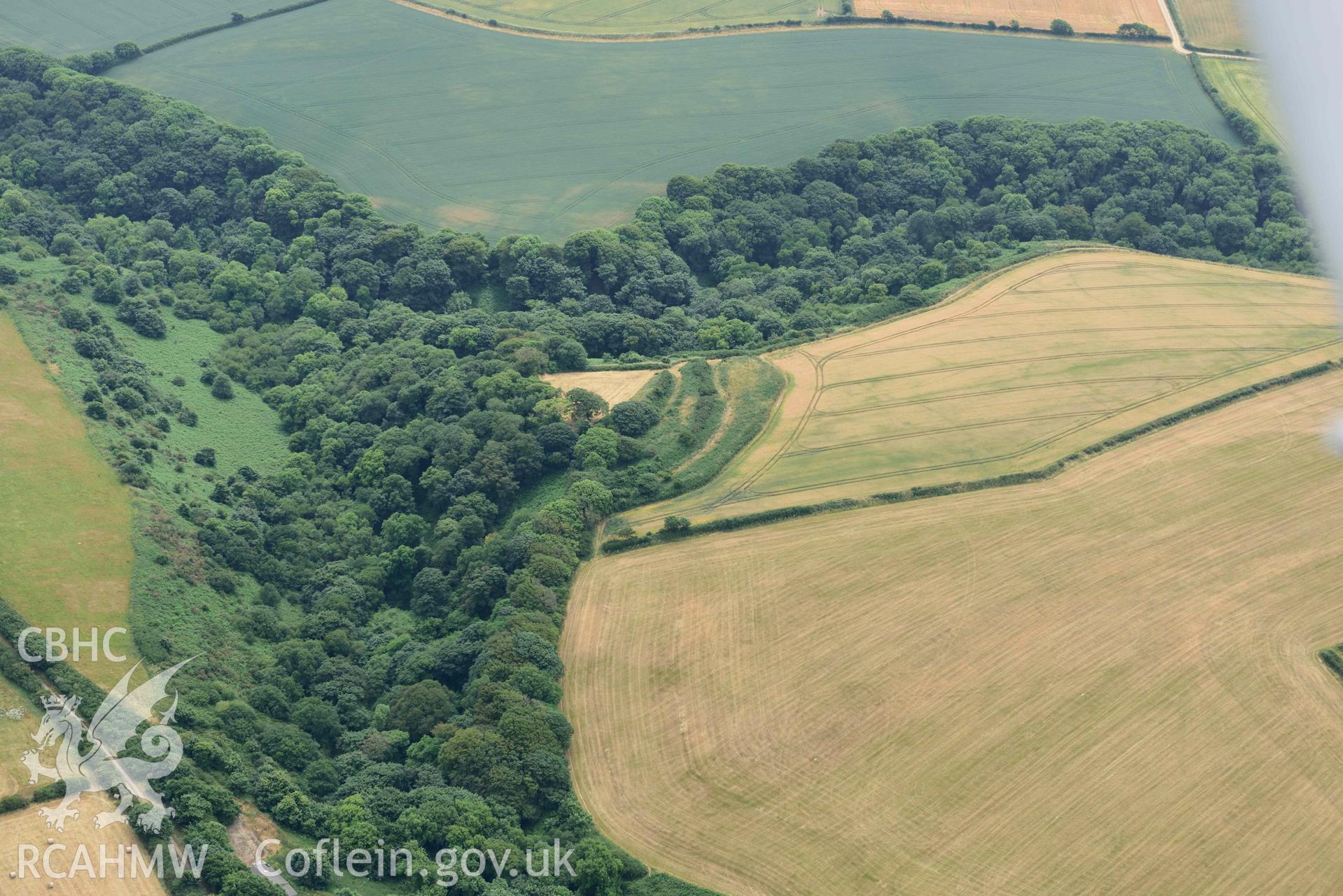 RCAHMW colour oblique aerial photograph of Brawdy promontory fort, with crop marks taken on 11 July 2018 by Toby Driver