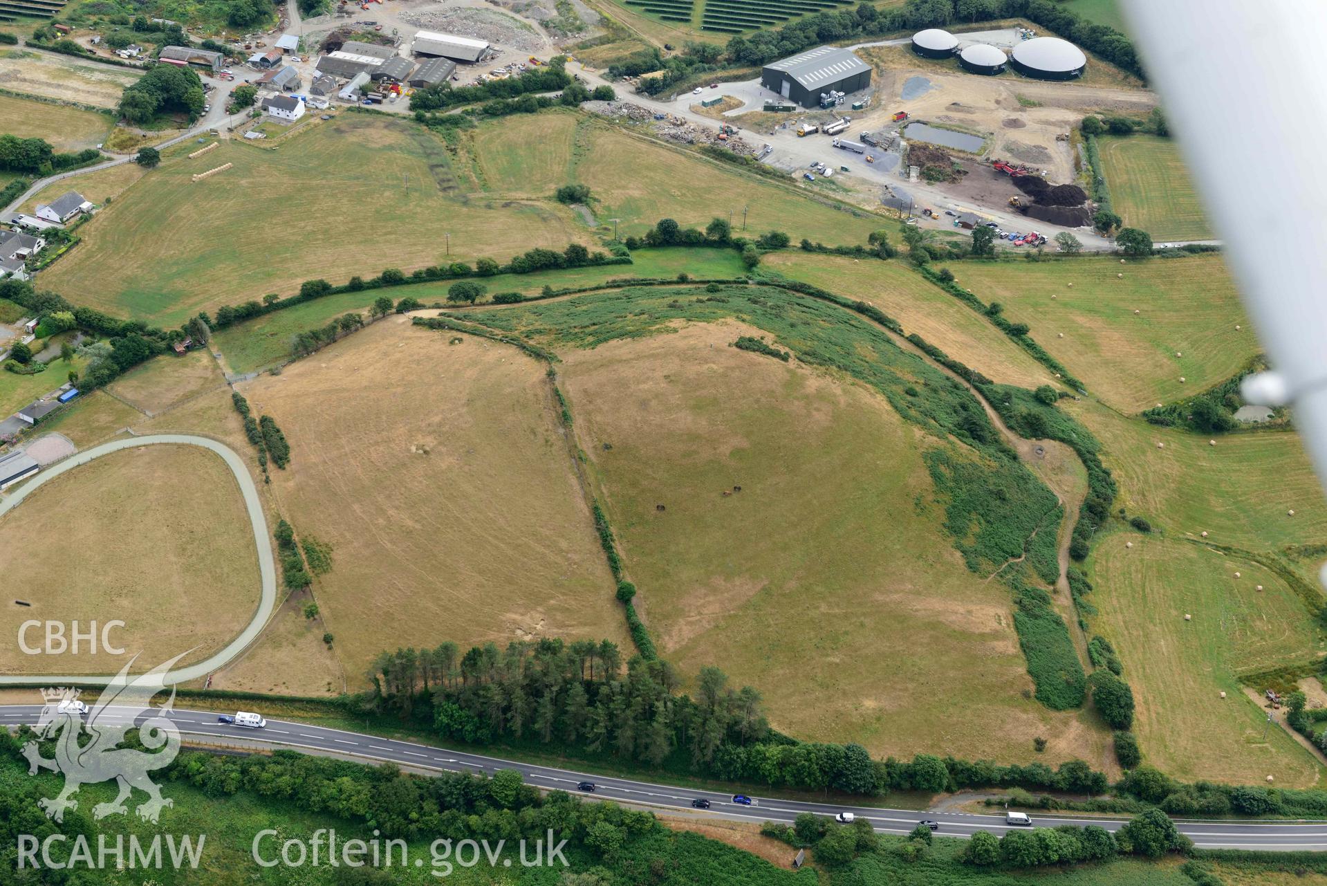 RCAHMW colour oblique aerial photograph of Banc y Warren hillfort taken on 11 July 2018 by Toby Driver