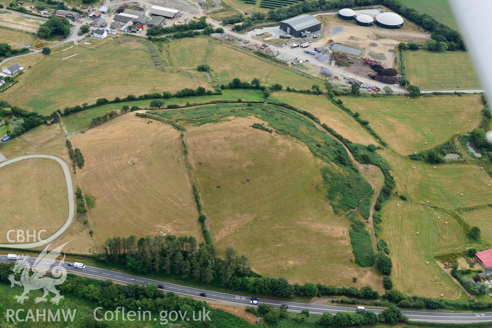 RCAHMW colour oblique aerial photograph of Banc y Warren hillfort taken on 11 July 2018 by Toby Driver