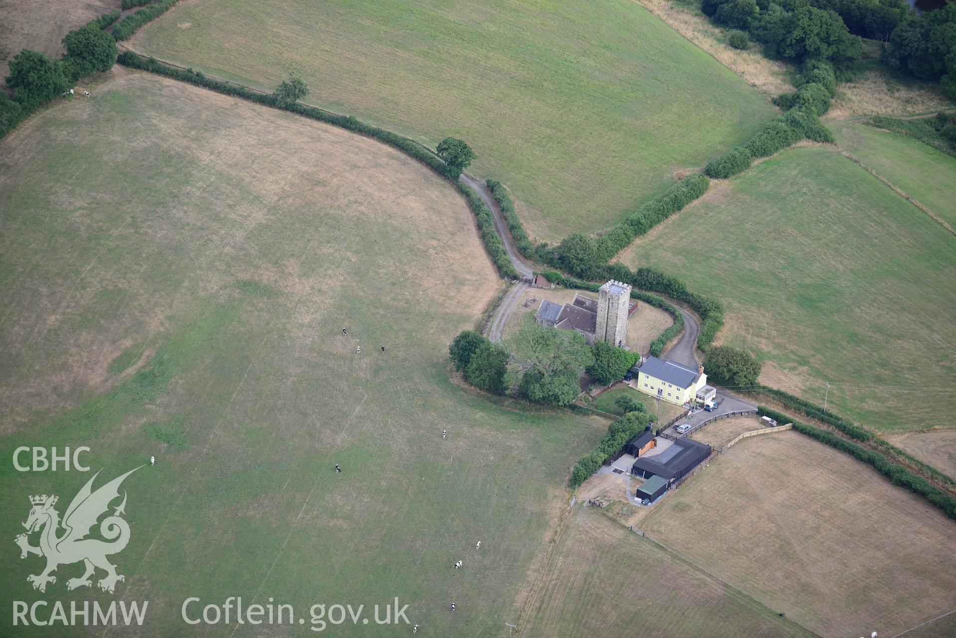 RCAHMW colour oblique aerial photograph of St Cynins Church taken on 17 July 2018 by Toby Driver