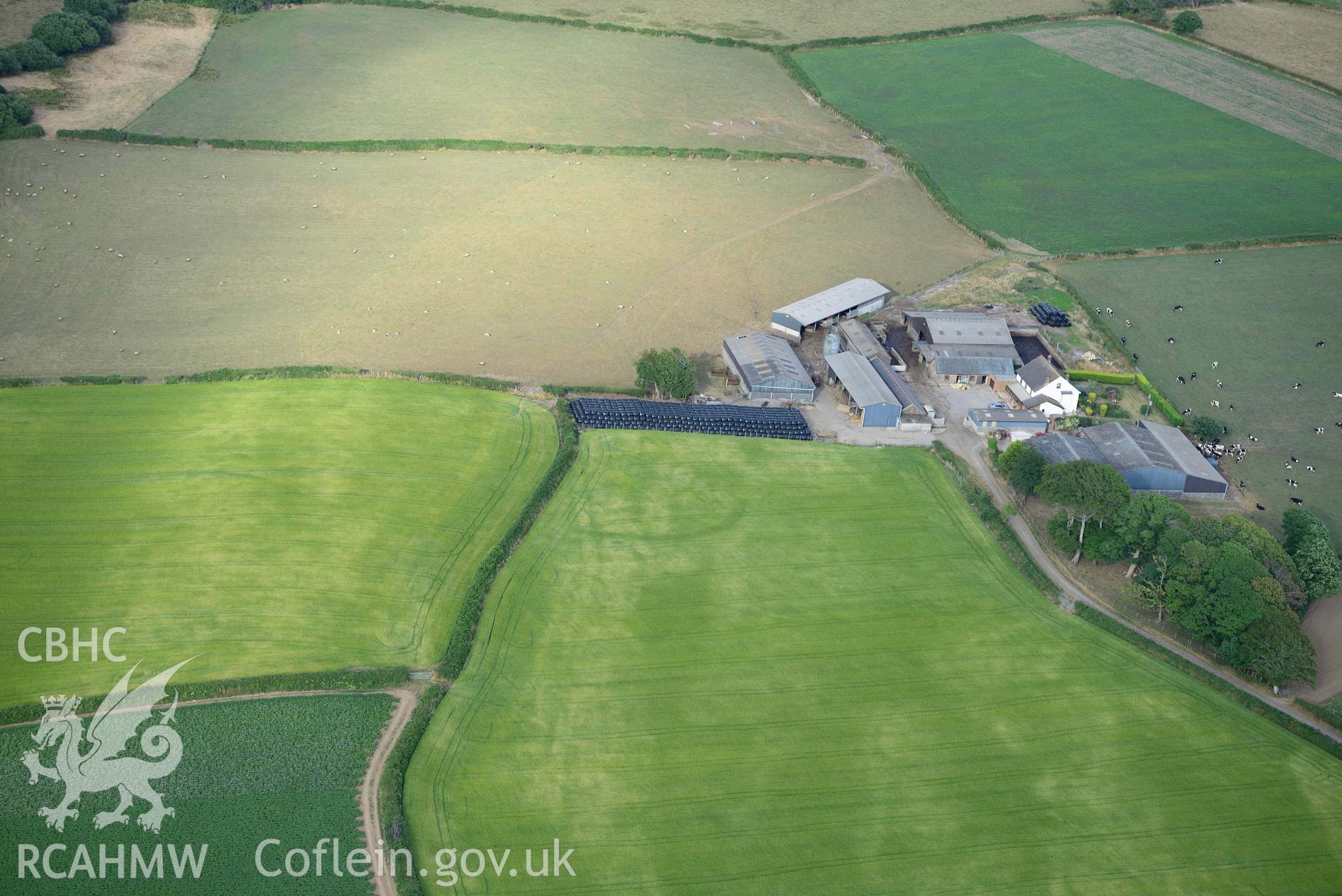 RCAHMW colour oblique aerial photograph of Parc Willis, cropmark of defended enclosure taken on 17 July 2018 by Toby Driver (NGR: SN470037)