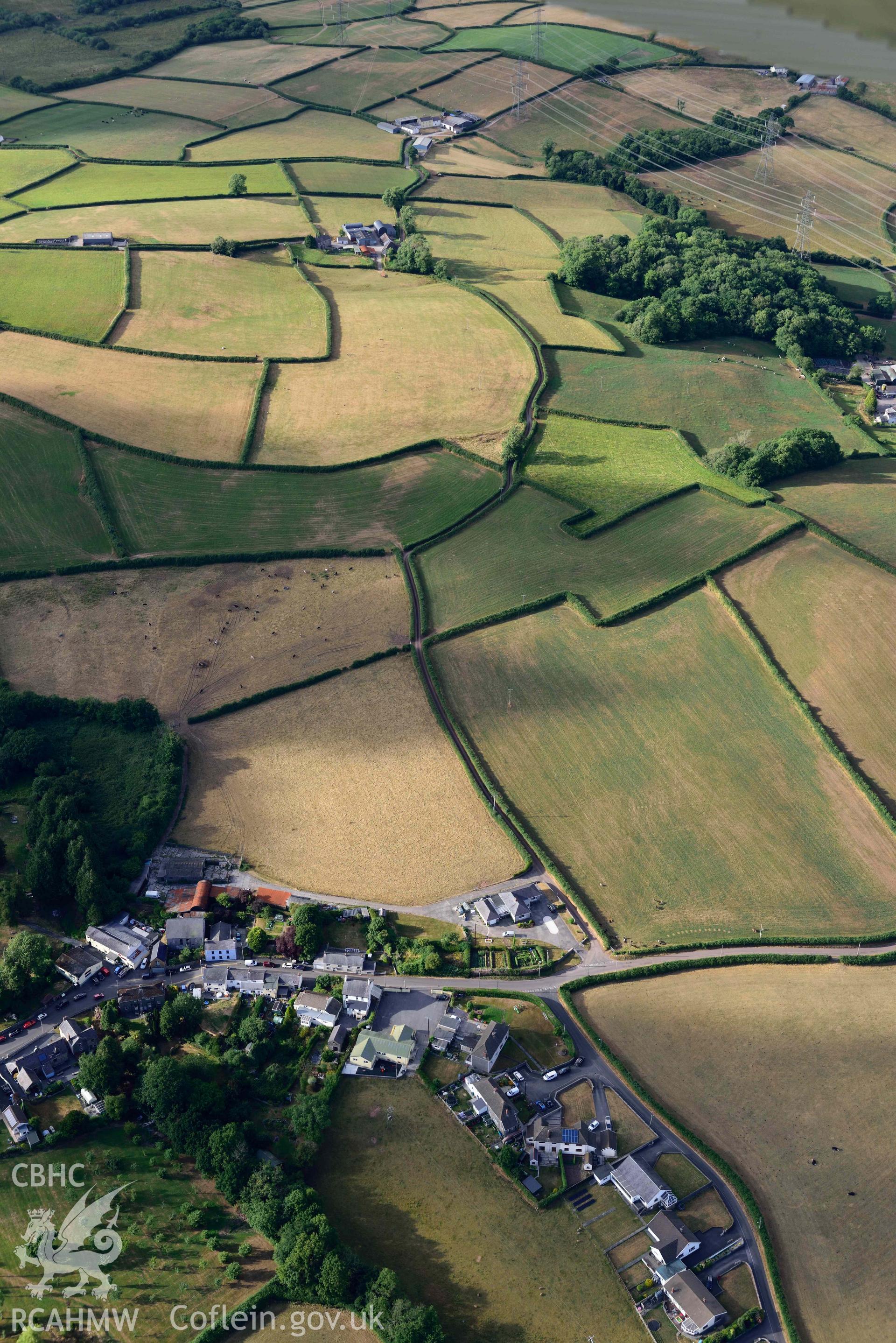 RCAHMW colour oblique aerial photograph of Roman road from Carmarthen to Kidwelly; line of road N of Llandyfaelog taken on 17 July 2018 by Toby Driver (NGR: SN416120)