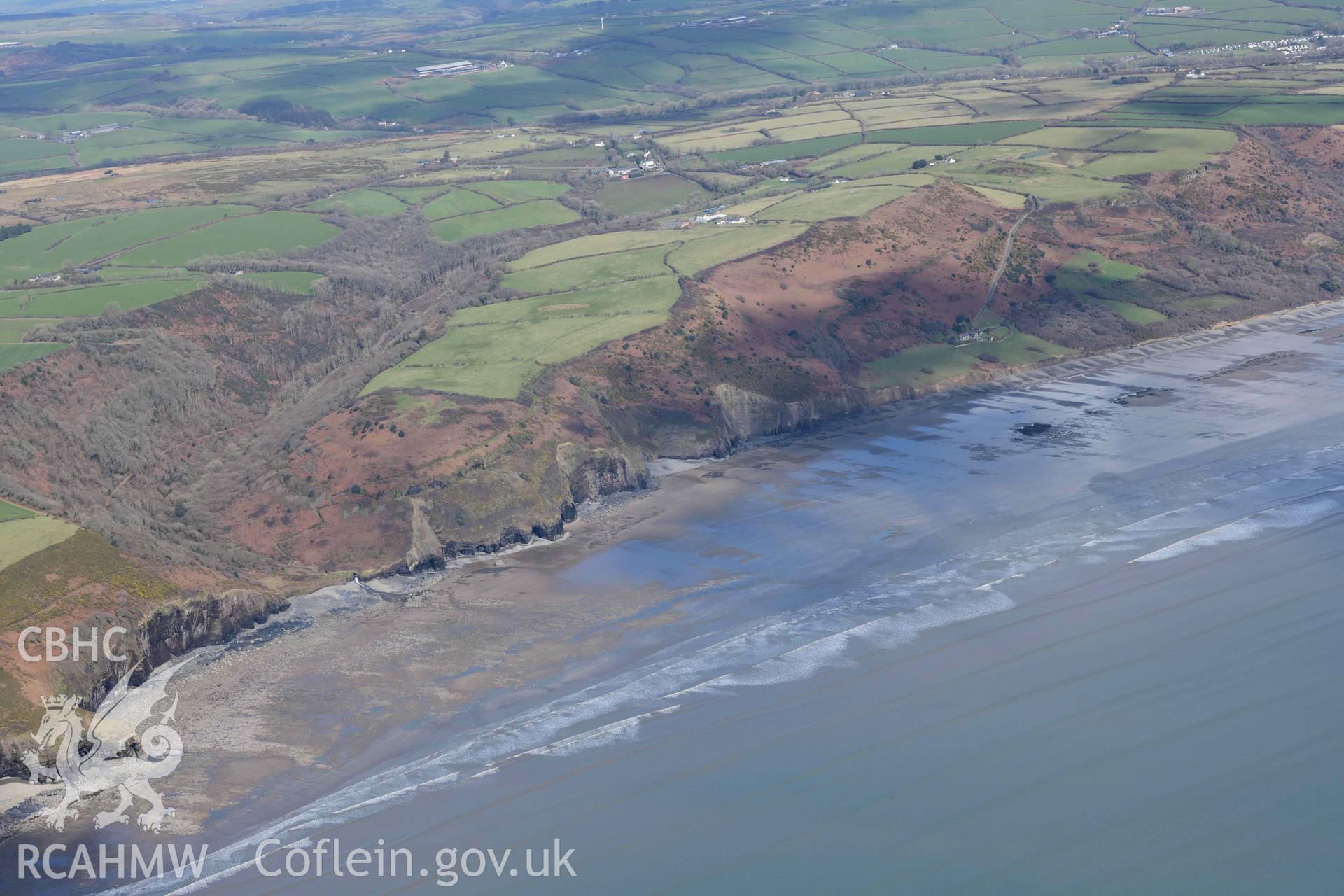 RCAHMW colour oblique aerial photograph of Marros Sands, peat deposits, view from SW taken on 4 March 2022 by Toby Driver (SN202074)