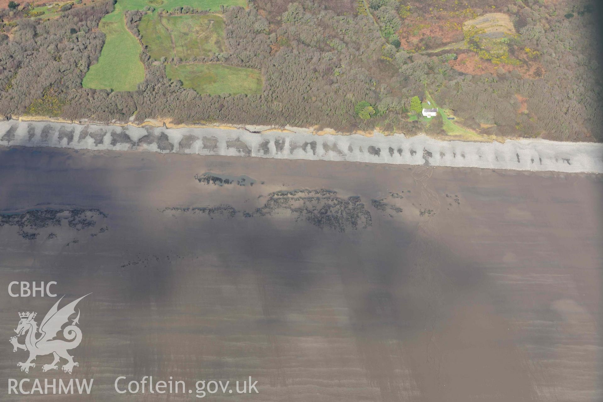 RCAHMW colour oblique aerial photograph of Marros Sands, peat deposits, south of Marros Mill taken on 4 March 2022 by Toby Driver ((SN206073)