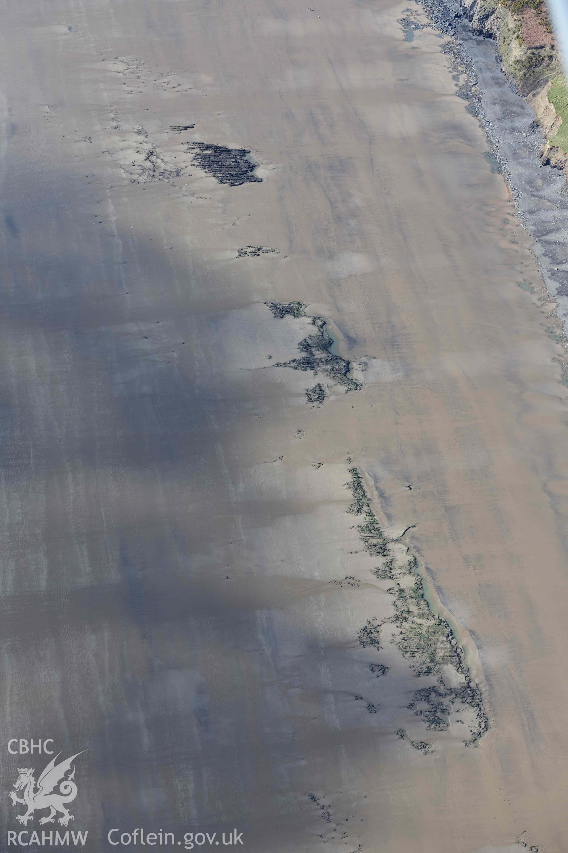 RCAHMW colour oblique aerial photograph of Marros Sands, peat deposits, south of Marros Mill, view from E taken on 4 March 2022 by Toby Driver ((SN206073)