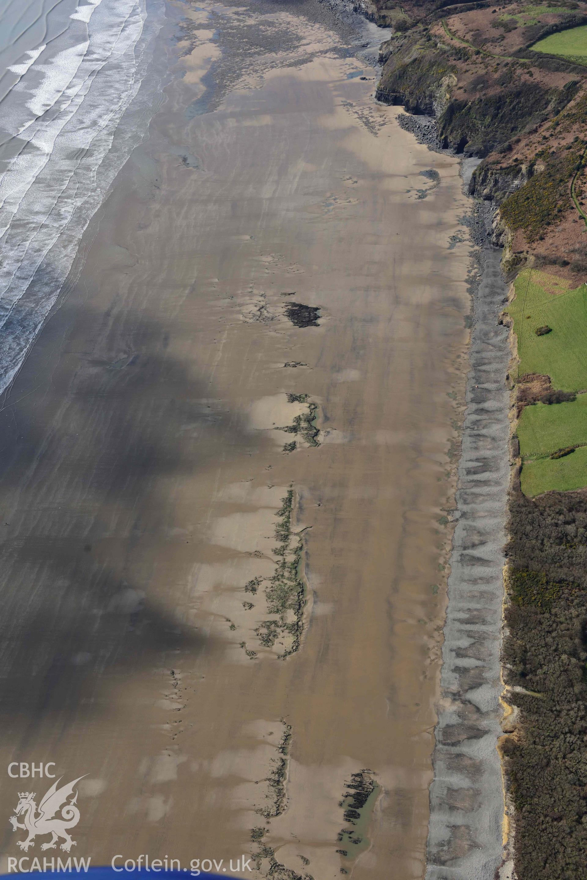 RCAHMW colour oblique aerial photograph of Marros Sands, peat deposits, view from E taken on 4 March 2022 by Toby Driver ((SN206073)