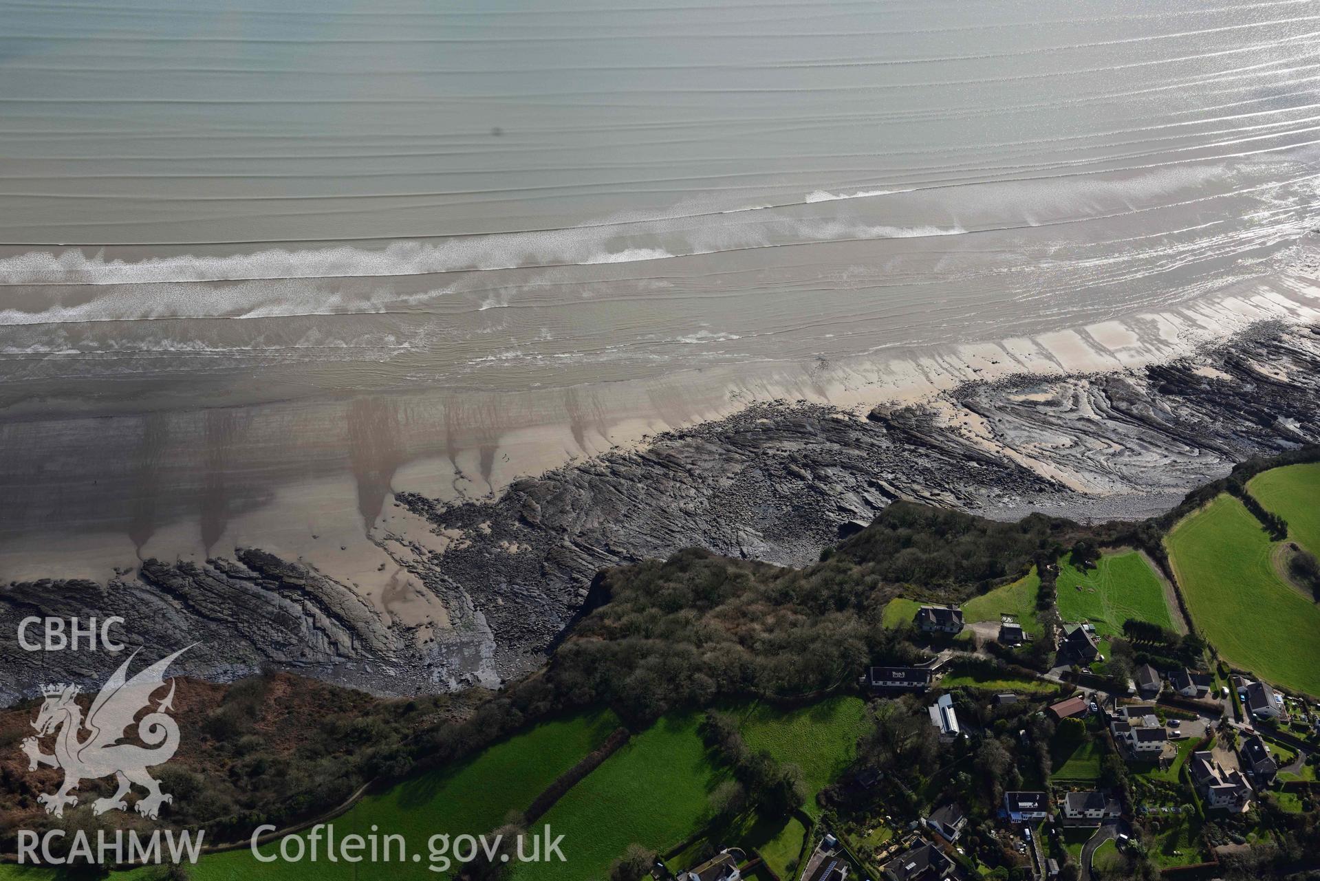 RCAHMW colour oblique aerial photograph of Wiseman's Bridge, coastal exposures following storms taken on 4 March 2022 by Toby Driver ((SN146060)