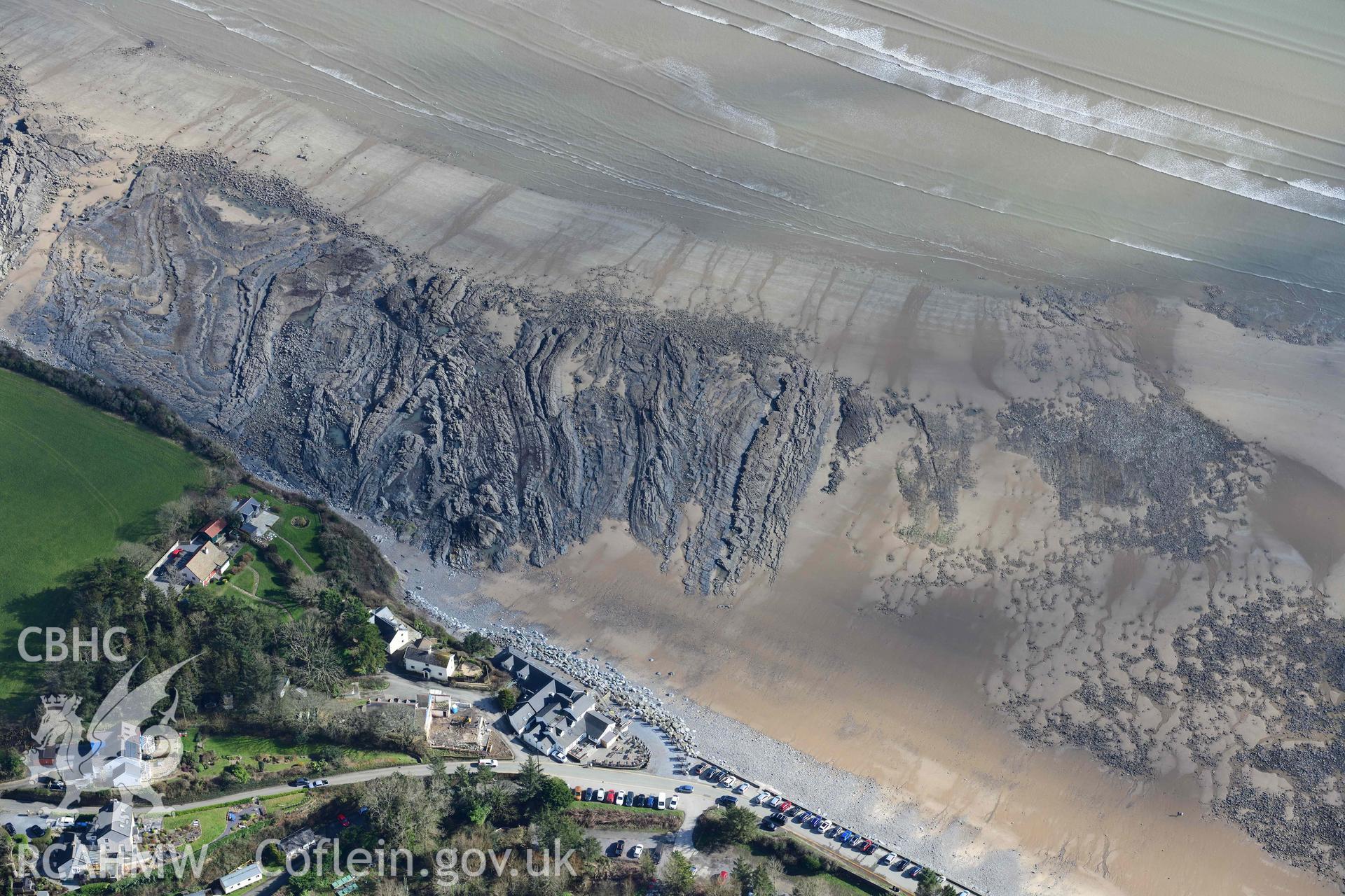 RCAHMW colour oblique aerial photograph of Wiseman's Bridge, coastal exposures following storms, looking east taken on 4 March 2022 by Toby Driver ((SN146060)