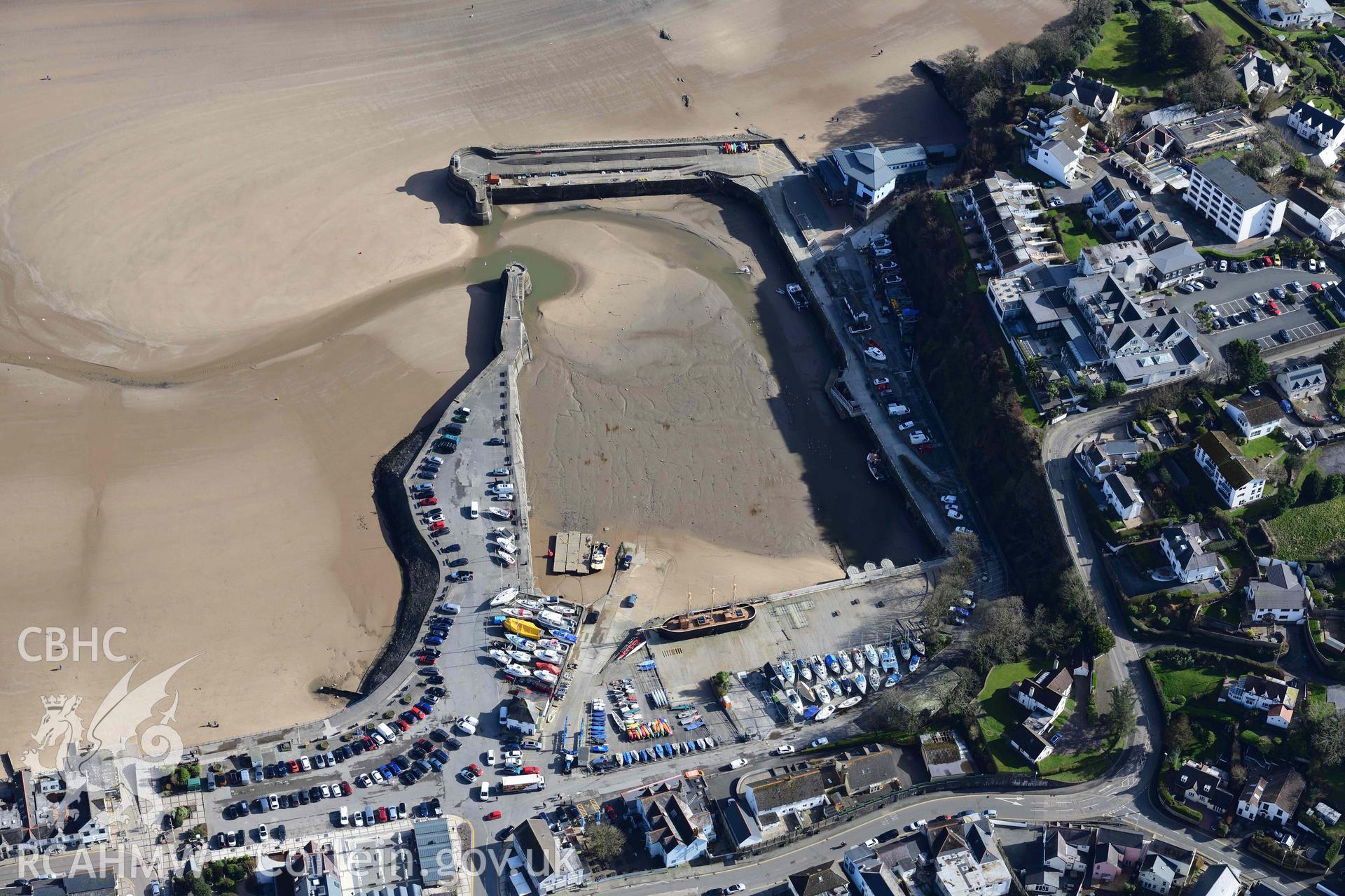 RCAHMW colour oblique aerial photograph of Saundersfoot Harbour, view from W, with Schooner coastal heritage centre taken on 4 March 2022 by Toby Driver ((SN137046)