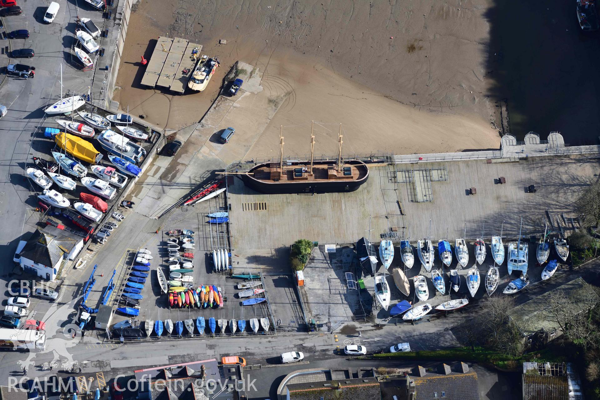 RCAHMW colour oblique aerial photograph of Saundersfoot Harbour, view from W, with Schooner coastal heritage centre taken on 4 March 2022 by Toby Driver ((SN137046)