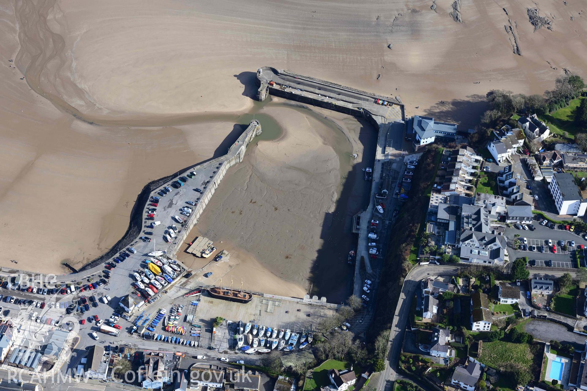 RCAHMW colour oblique aerial photograph of Saundersfoot Harbour, view from W, with Schooner coastal heritage centre taken on 4 March 2022 by Toby Driver ((SN137046)