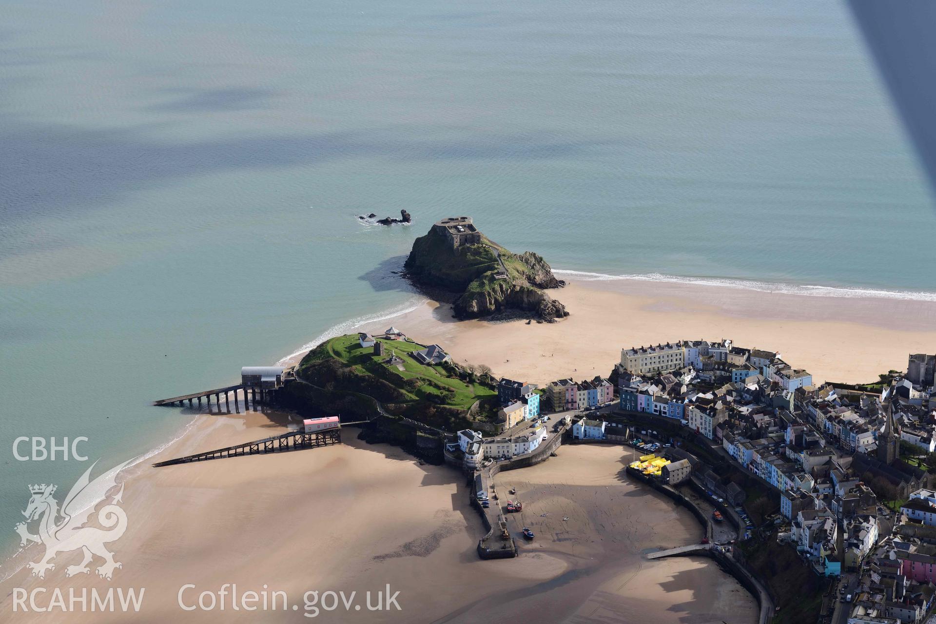 RCAHMW colour oblique aerial photograph of Tenby town and harbour, view from NW taken on 4 March 2022 by Toby Driver ((SN136005)